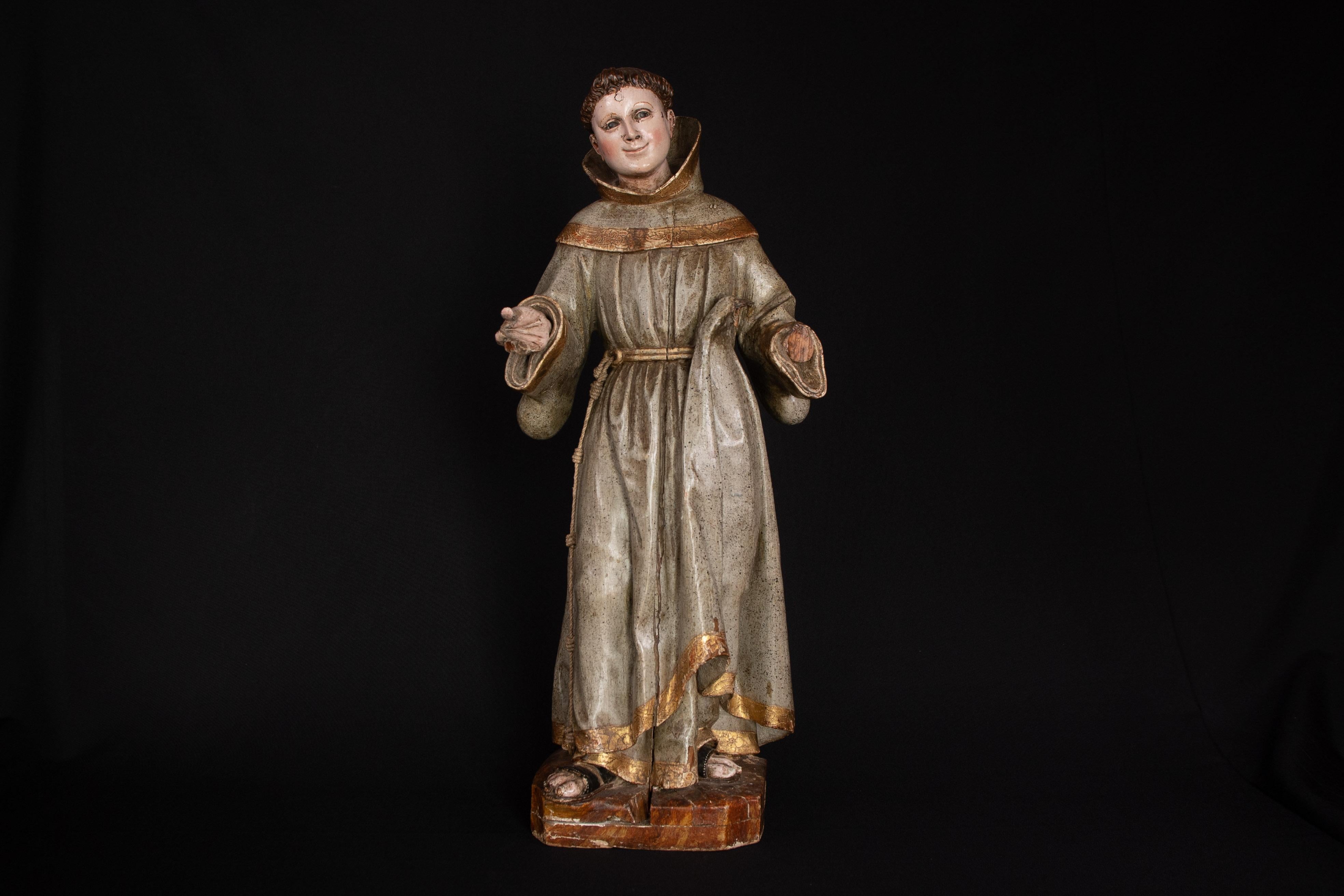 Wooden (oak) monk from the second half of the 18th century with glass eyes. Comes from a chapel in Ypres (Belgium). 

Fingers and 1 hand are missing, but the corps and face are still in very good condition, considering the age.