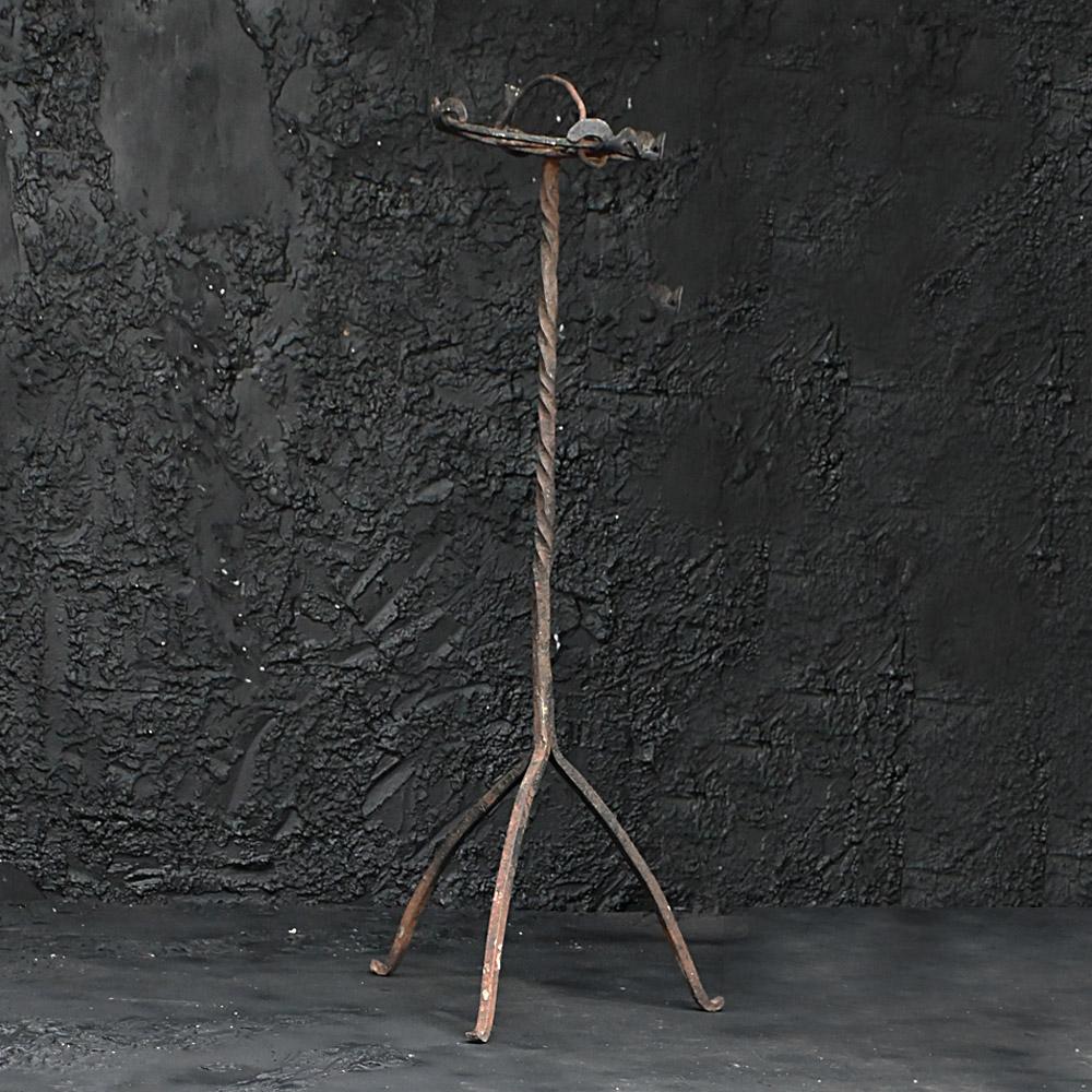 18th Century Hand Forged Wrought Iron Fireplace Trivet    

An unusual example in the form of a tall or even elegant design, 18th Century hand crafted wrought iron trivet. The forged handle at the top has been added after for some reason. This