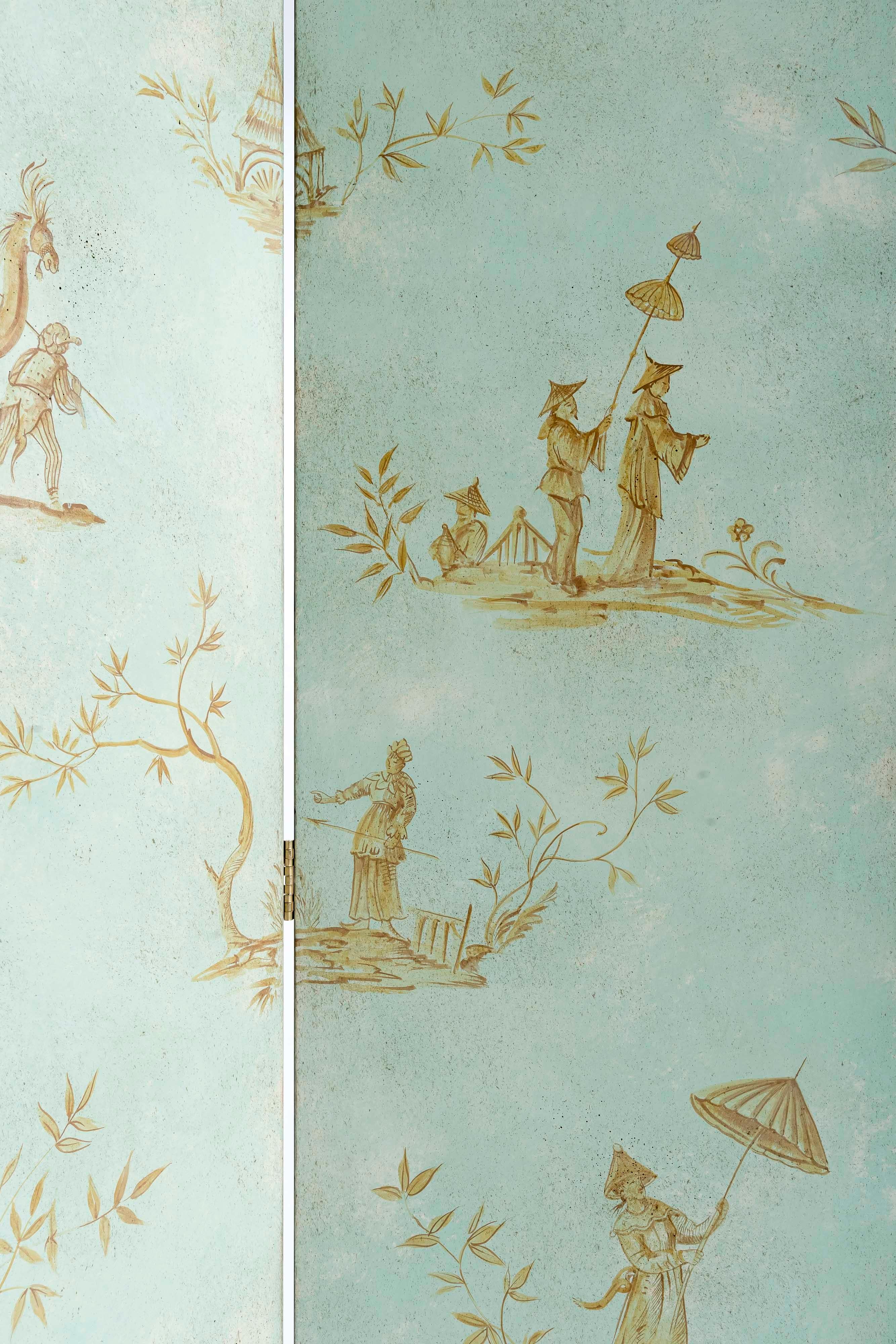 From our Hand-Painted Furniture Collection, we are pleased to introduce you to our aquamarine otello screen with ochre chinoiserie vignettes. 
A hand-painted screen evokes the luxury of 18th century Venetian style. Composed of a custom number of