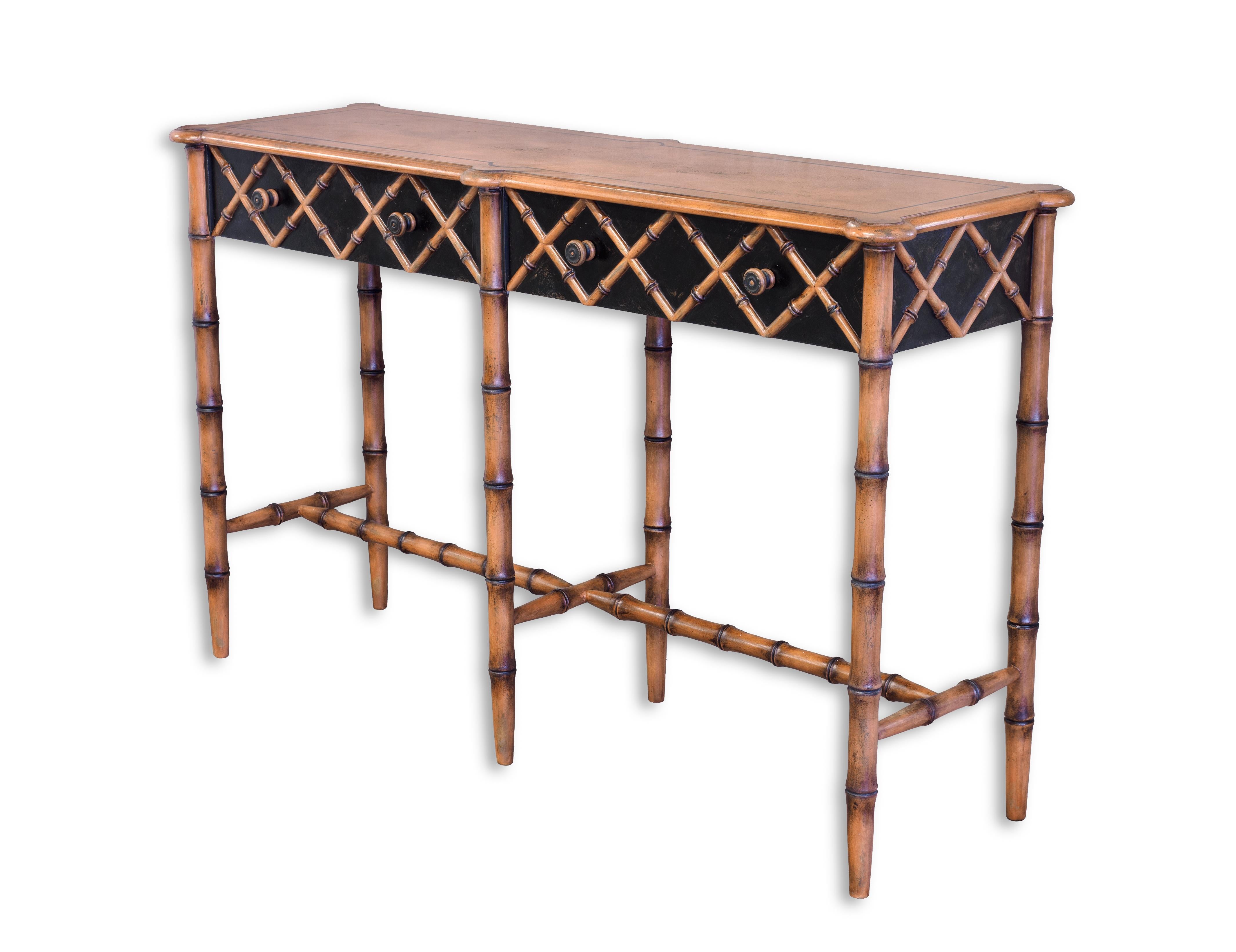 From our hand-painted Furniture Collection, we are pleased to introduce you to our Provenza Bamboo Console with drawers. 
Finished in a timeless black backround with bamboo criss cross accents, this eclectic console will surely add that touch of
