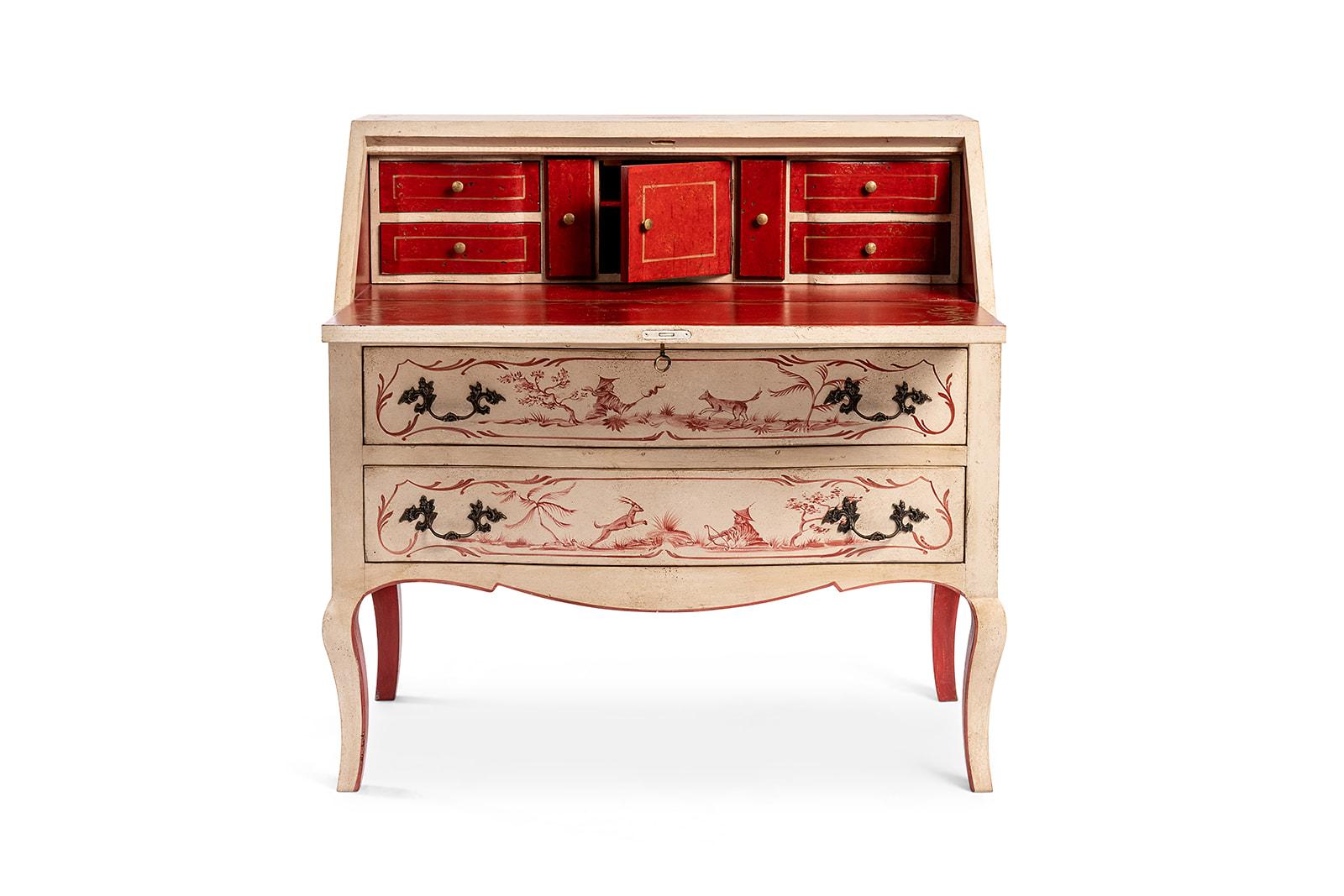 From our Hand-Painted Furniture Collection, we are pleased to introduce you to our Doge Bureau. 
This Porte Italia’s elegant and timeless bureau will infuse style in any room, with its rich red detailed chinoiserie in contrast with the light taupe
