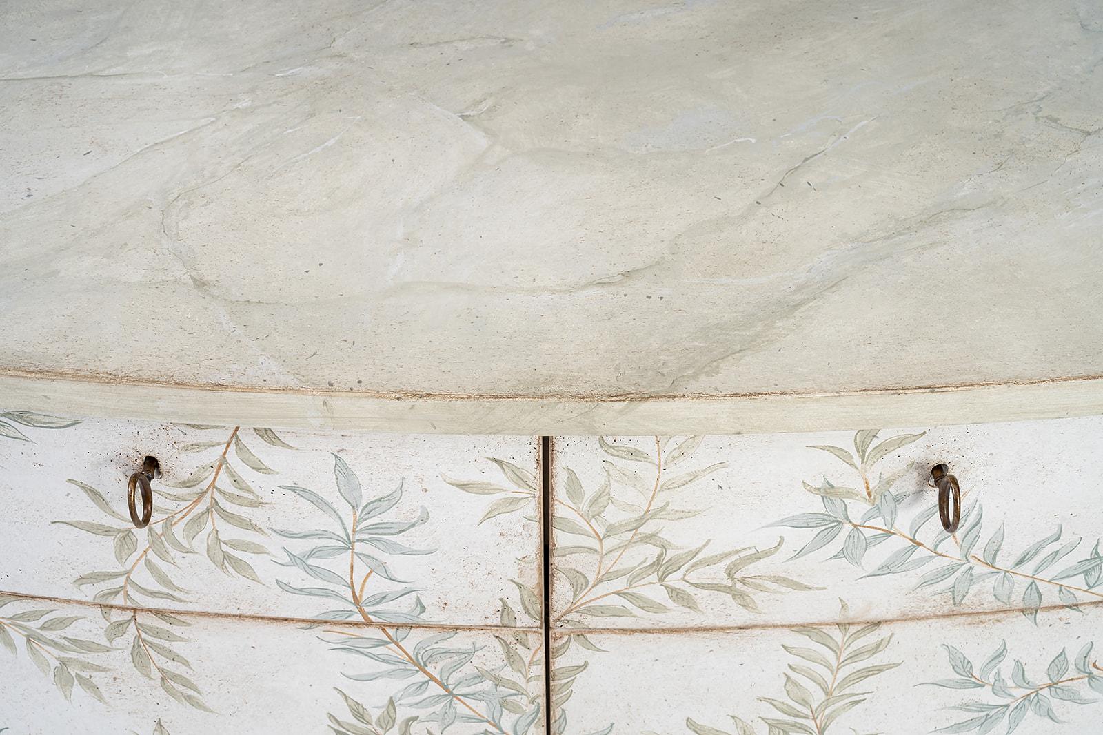 From our Hand-Painted Furniture Collection, we are pleased to introduce you to our Chalky white Dorsoduro Cabinet. 
This beautiful piece is made re-interpreting a classic from the world of design the intertwined leaves decorations that we designed
