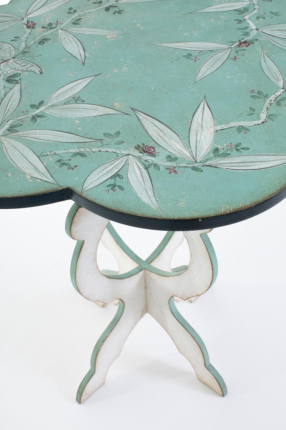 From our Hand-Painted Furniture Collection, we are pleased to introduce you to our sea green Santa Maria del Giglio table with monochromatic foliage decor.
This little scalopped tea table is designed as a beautiful bed side table or tea table, for