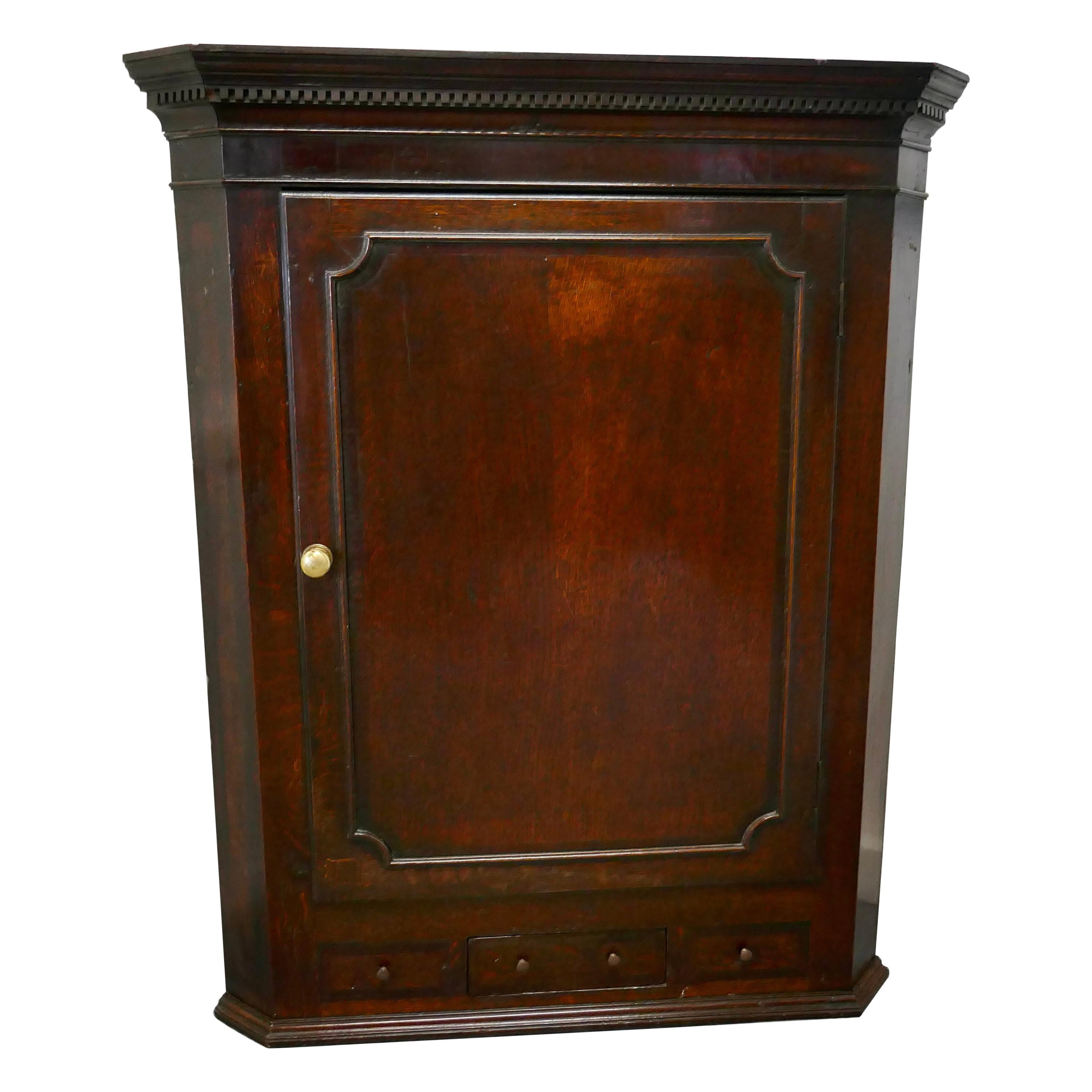 18th Century Inlaid Country Oak Corner Cupboard For Sale