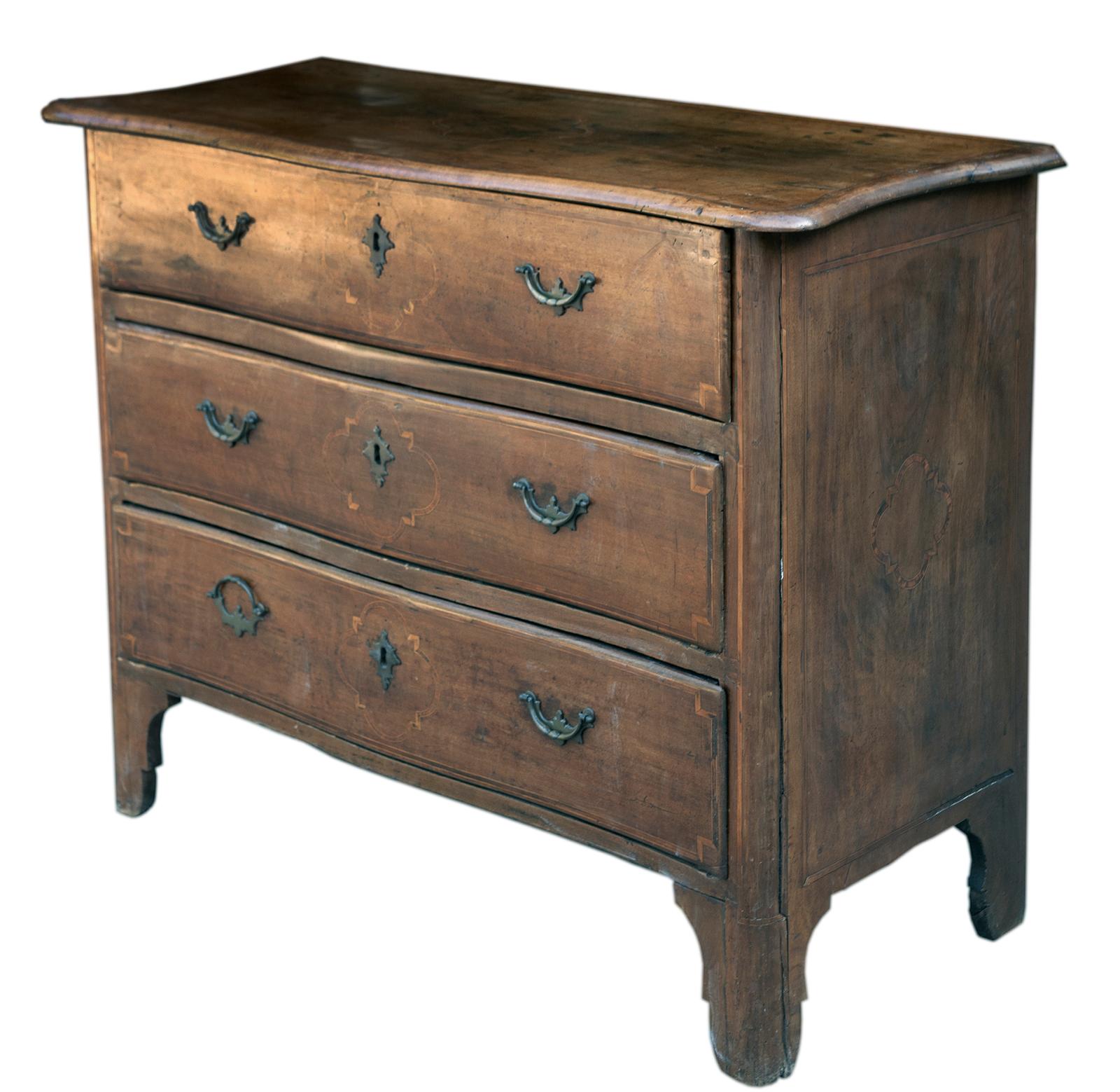 Stunning, 18th century Italian chest with three full sized lined drawers. The tope sides & drawers are adorned with geometric marquetry, bronze pulls & escutcheon keyplates.