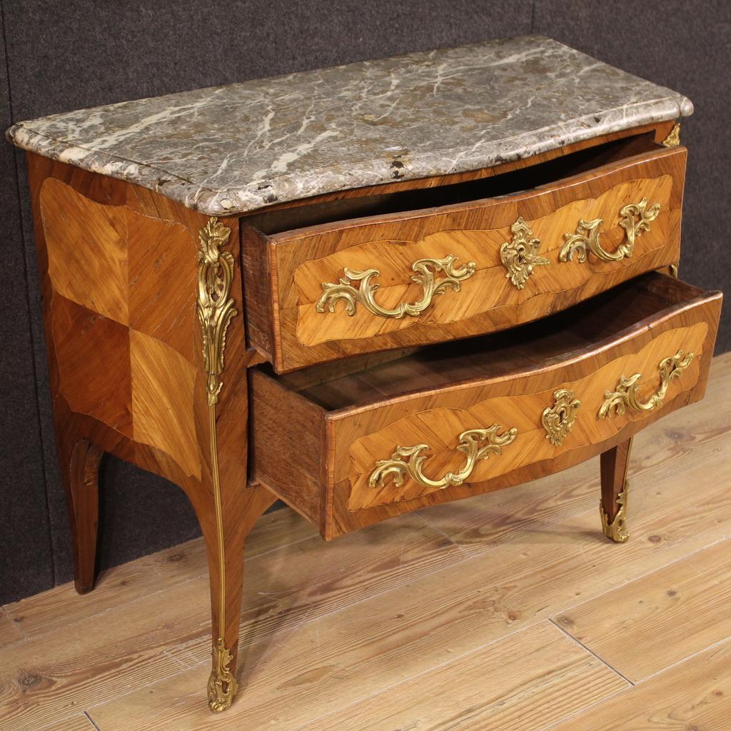 Antique French chest of drawers from the mid-18th century. Louis XV furniture of great elegance and quality inlaid and veneered in walnut, bois de rose and maple. Chest of drawers with two drawers of good capacity adorned with handles and