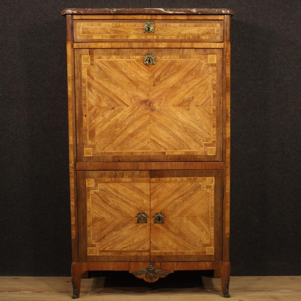 Antique French secrétaire from the Louis XVI era. High quality furniture with gilded bronze decorations and inlaid in walnut, rosewood, oak, mahogany, maple, tulipwood and fruitwood. Secrétaire equipped with original marble top which has undergone a