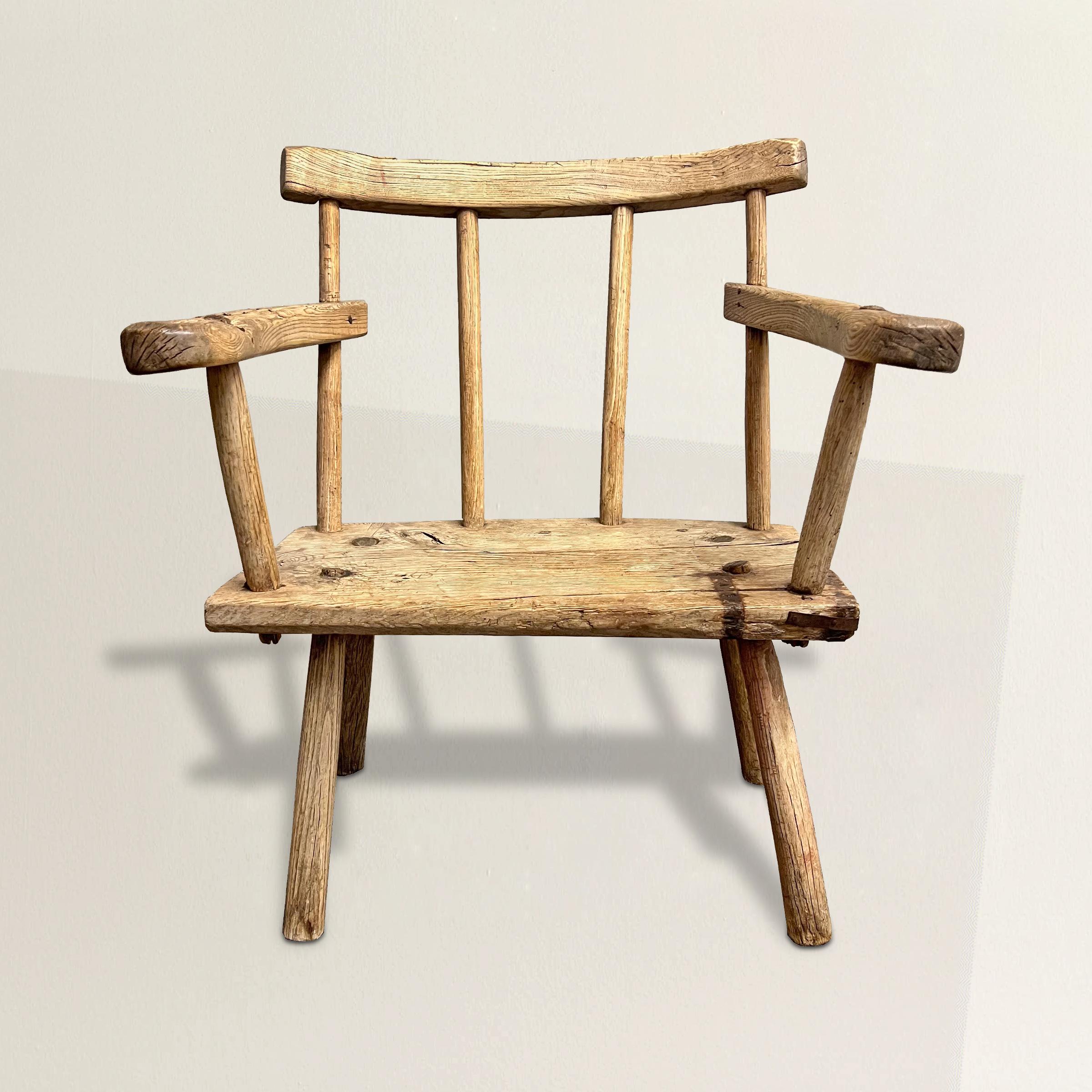 Step into the rustic elegance of this 18th-century Irish ash hedge chair, a remarkable embodiment of Ireland's rich heritage and the ingenuity of its craftsmen. A true hedge chair has roots in traditional folk art being constructed from found
