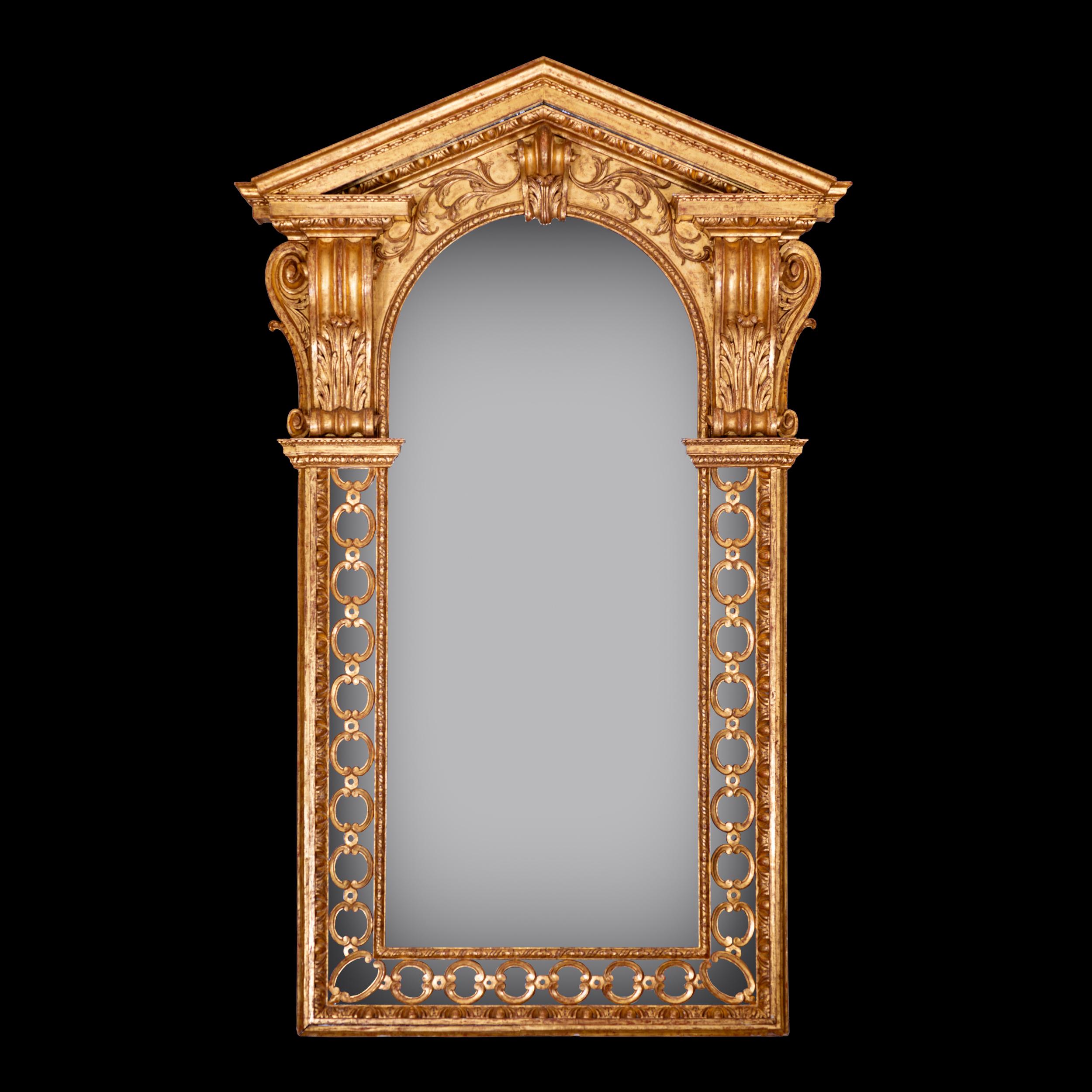 This extraordinary architectural mirror belongs to a group of mirrors by the Booker family that all share similar strong influences of William Kent.. A drawing by Kent for an organ case, engraved by John Vardy, relates to the design of the mirror. A