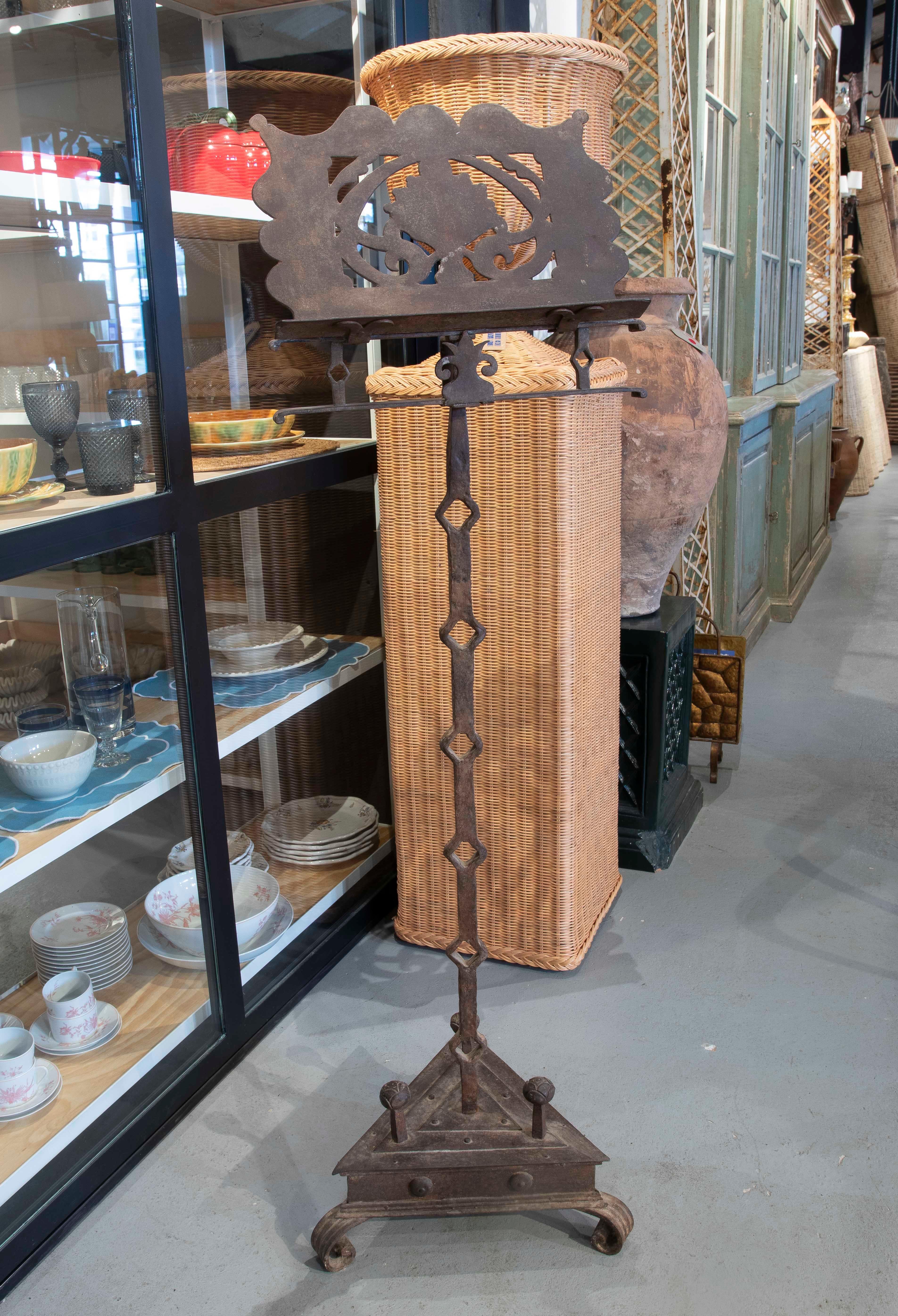 Spanish 18th Century Iron Stand with Triangular Foot and Decorations For Sale