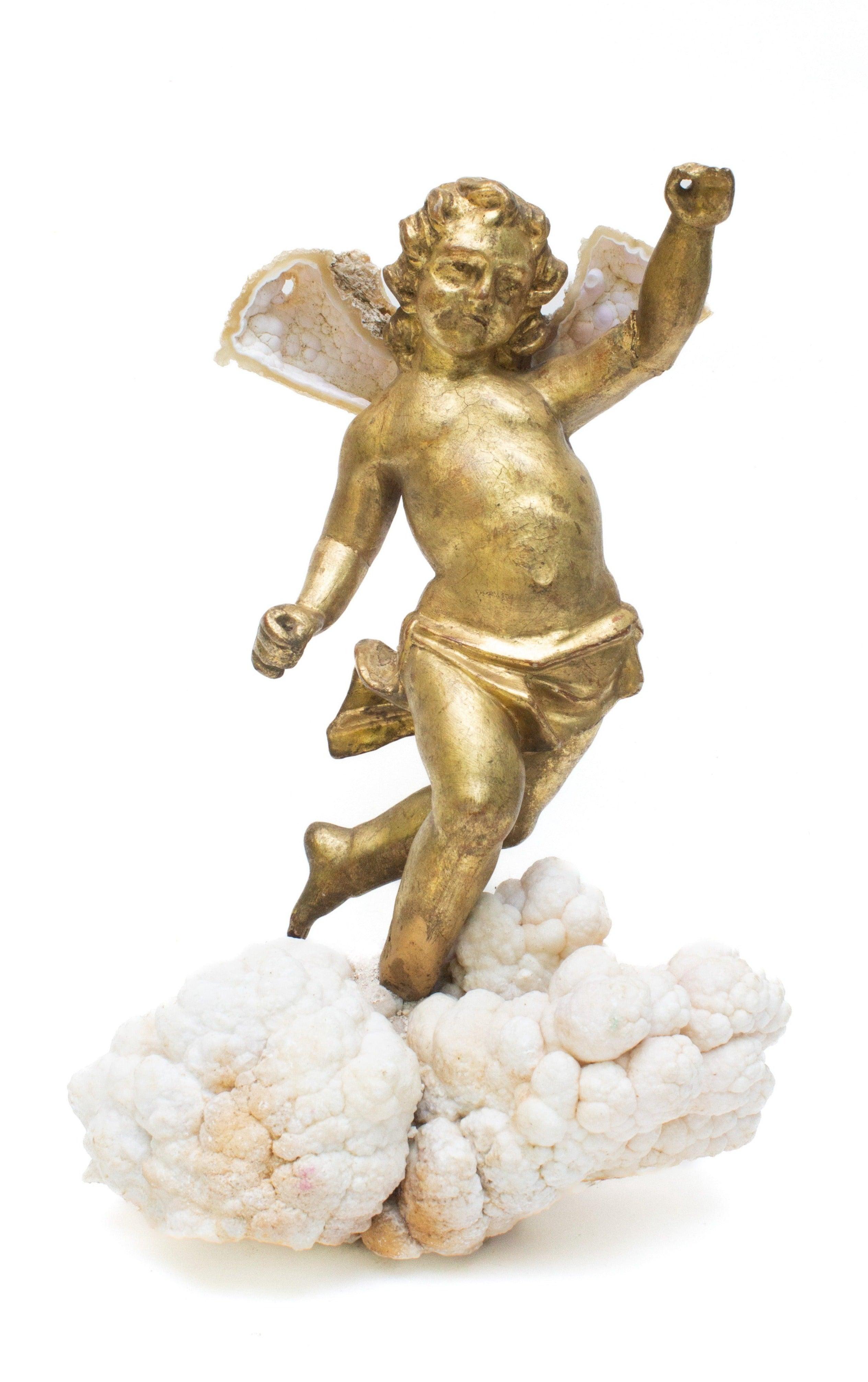 18th century Italian hand-carved gold leaf angel with fossil agate coral wings and mounted aragonite. 

The hand-carved angel was once part of a decorative, angelic depiction in a historic church in Tuscany. The piece is adorned with the fossil