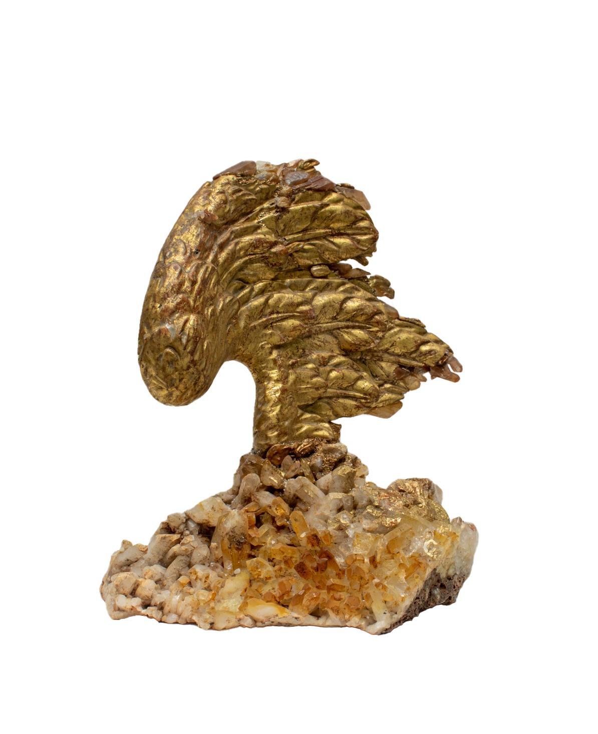 18th century Italian hand-carved gold leaf angel wing on a crystal quartz cluster with Baroque pearls.

The hand-carved gold leaf angel wing is originally from a historic church in Liguria. This piece is particularly rare and exquisite due to its
