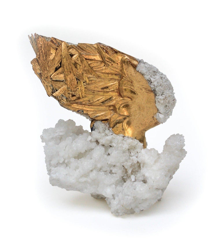 18th century Italian gold leaf angel wing with gold-plated kyanite on natural-forming aragonite.

The angel wing originally came from a church in Liguria. It was once used as part of a decorative motif in angelic depictions in a historic Italian