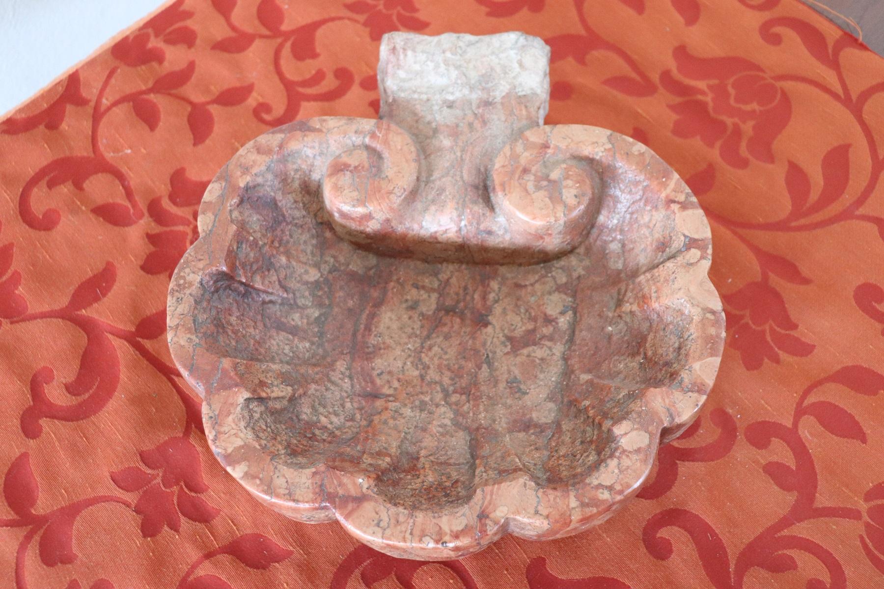 Beautiful rare Italian hand carved Verona marble font. Authentic Baroque era. The holy water font has a typical shell shape. Marble has the patina and the fascinating signs of wear due to all these past centuries. It comes from an Italian private