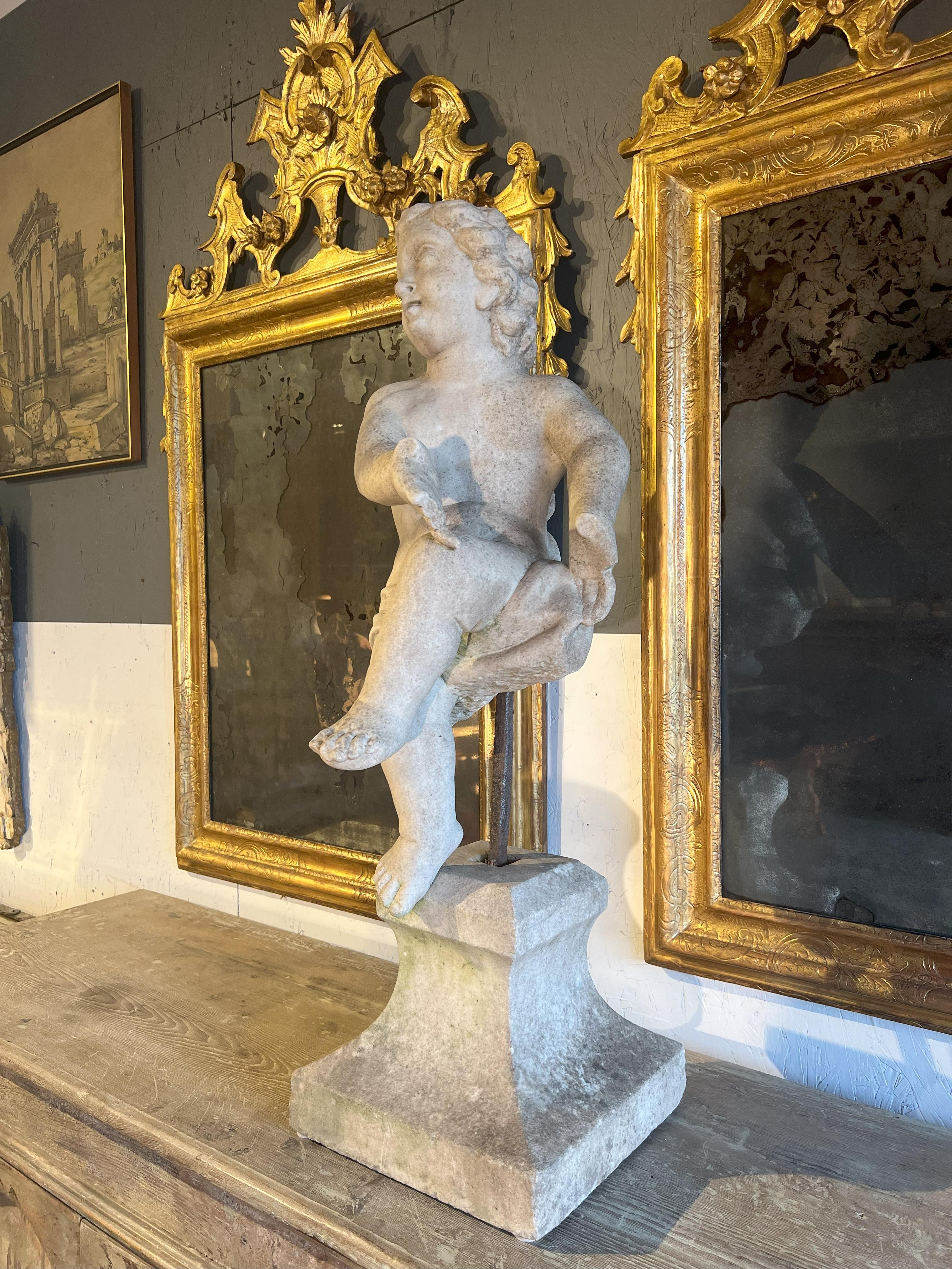 Baroque 18th Century Italian Antique Dancing Putto small on a base.   For Sale