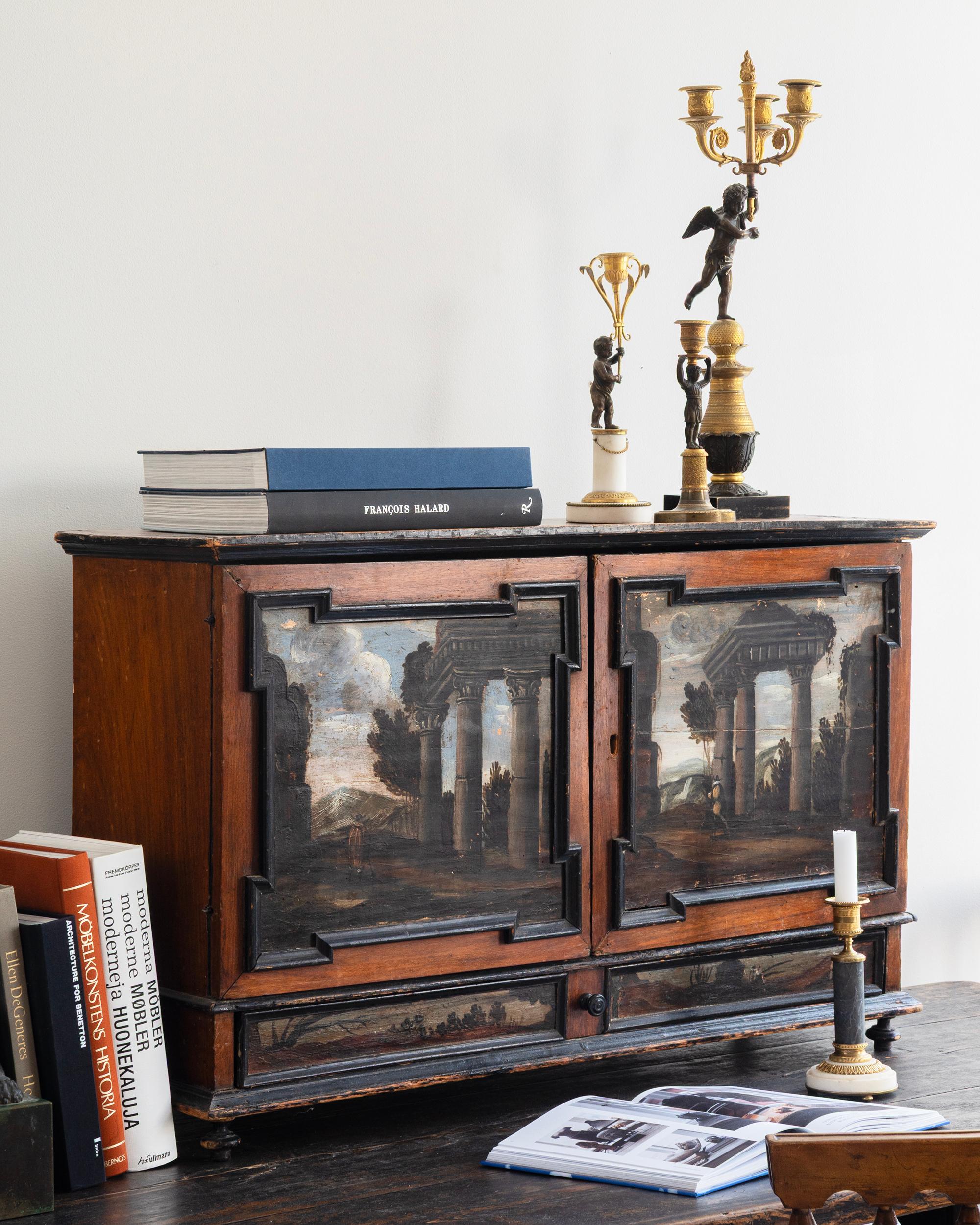 18th century Italian Baroque cabinet with capriccio's painted on the doors and drawer. Interior covered with Carta di Varese. Ca 1750, Italy. 