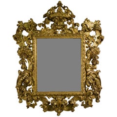 18ème siècle:: Miroir baroque italien en bois doré