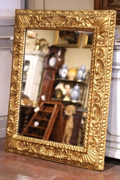 18th Century Italian Baroque Giltwood Wall Mirror with Carved Shell and Foliate