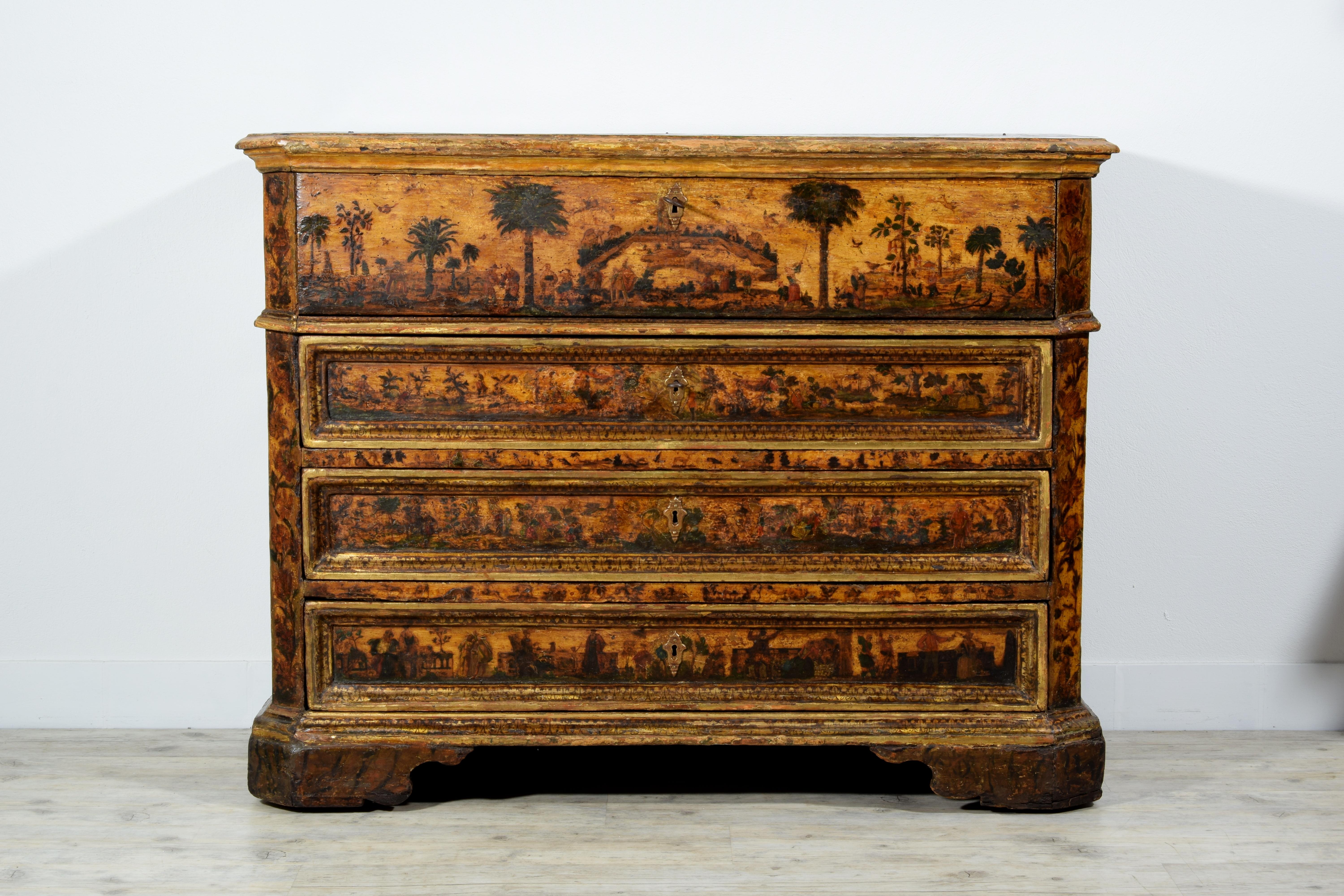 18th century, Italian baroque lacquered wood chest of drawers

This rare and particular baroque chest of drawers was made around the beginning of the eighteenth century in Italy. Its wooden structure is entirely lacquered and decorated with mixed