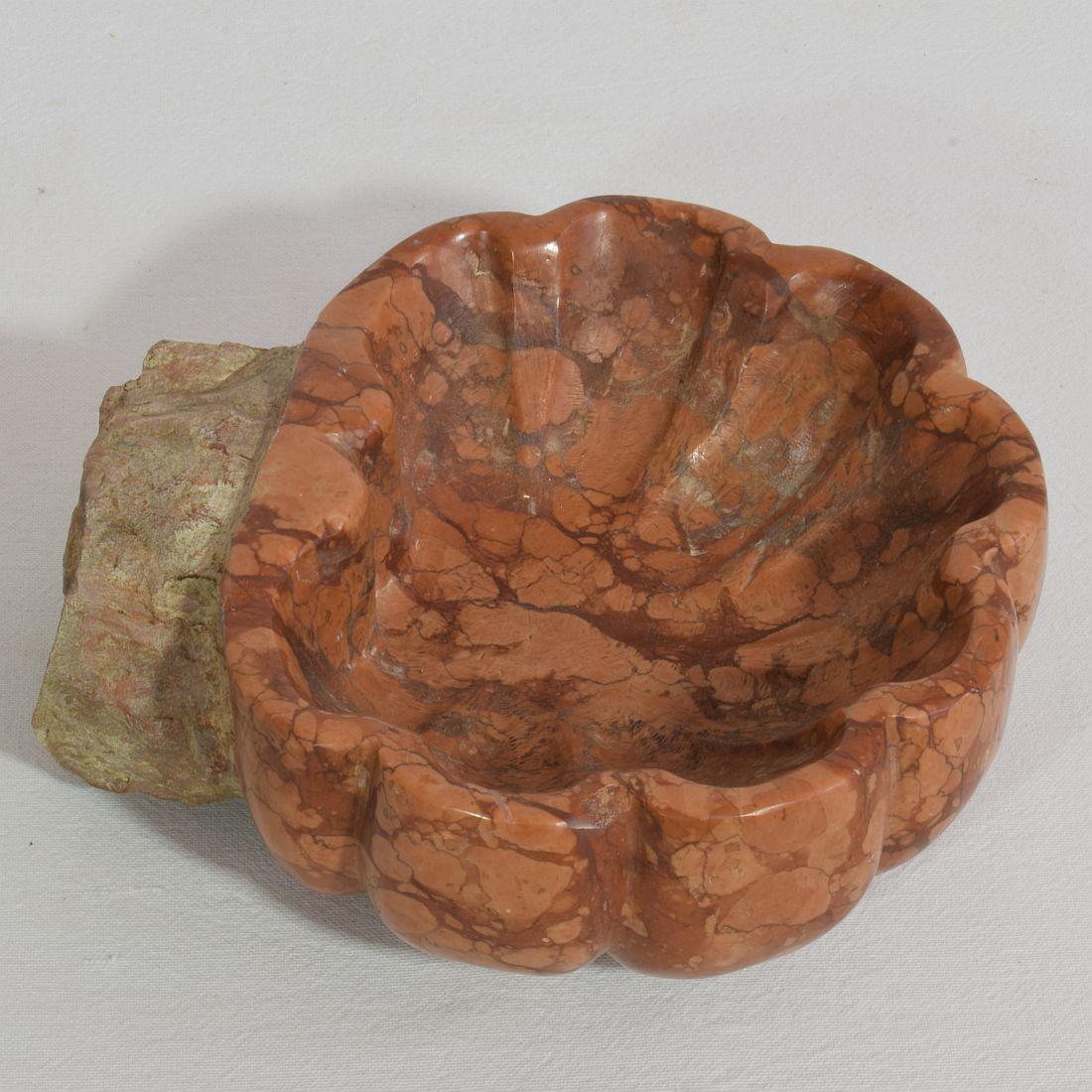 Unique Baroque red marble holy water font or stoup with great patina, Italy, circa 1750.
Weathered,
Measures: H:7,5cm W:20cm D:16-21cm.