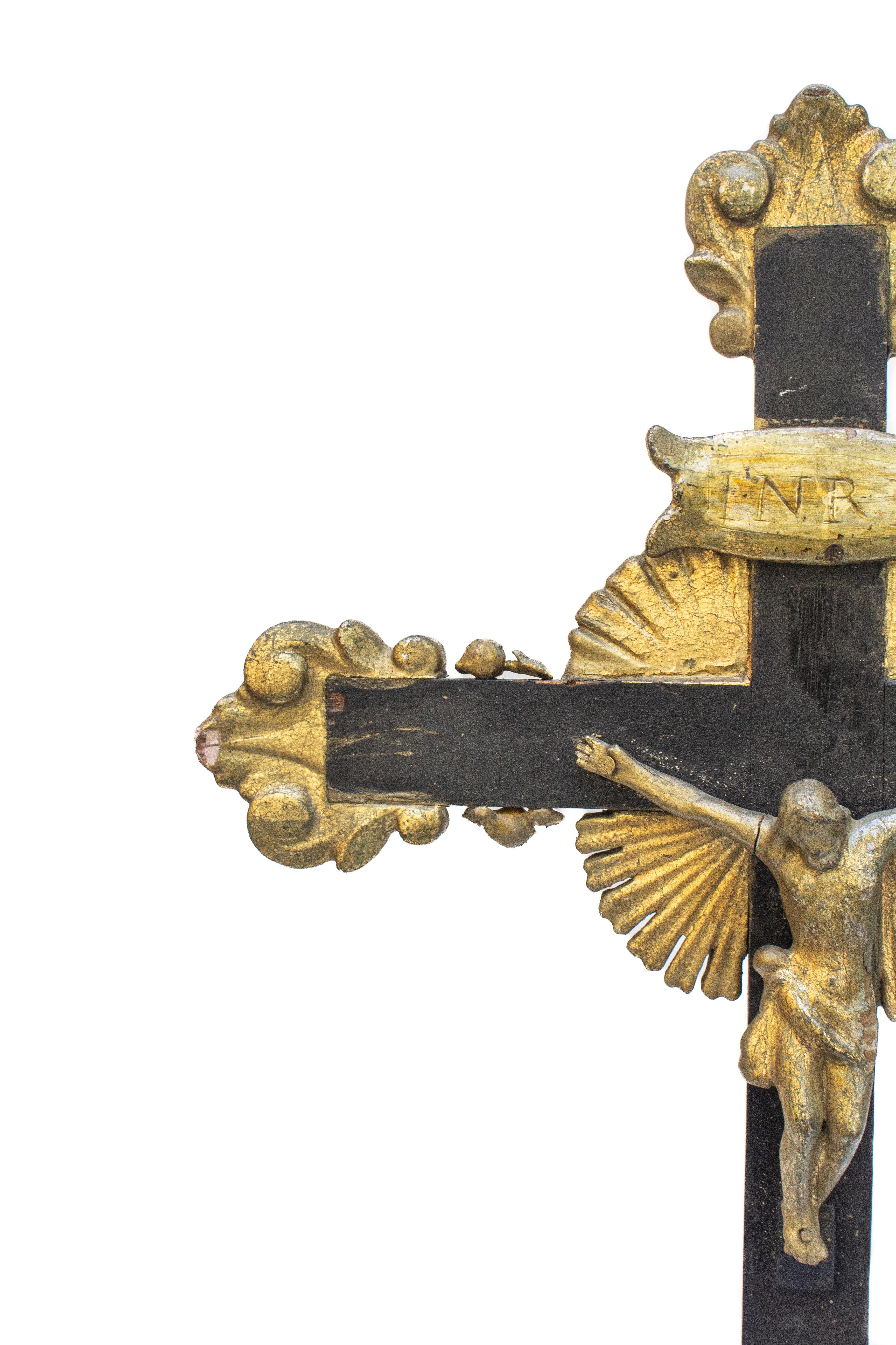 18th century Italian black crucifix with a gold figure of Christ. It is adorned with baroque pearls and mounted on a piece of bornite with chalcopyrite. The gold figure of Christ coordinates with the gold baroque pearls.

The piece is put together