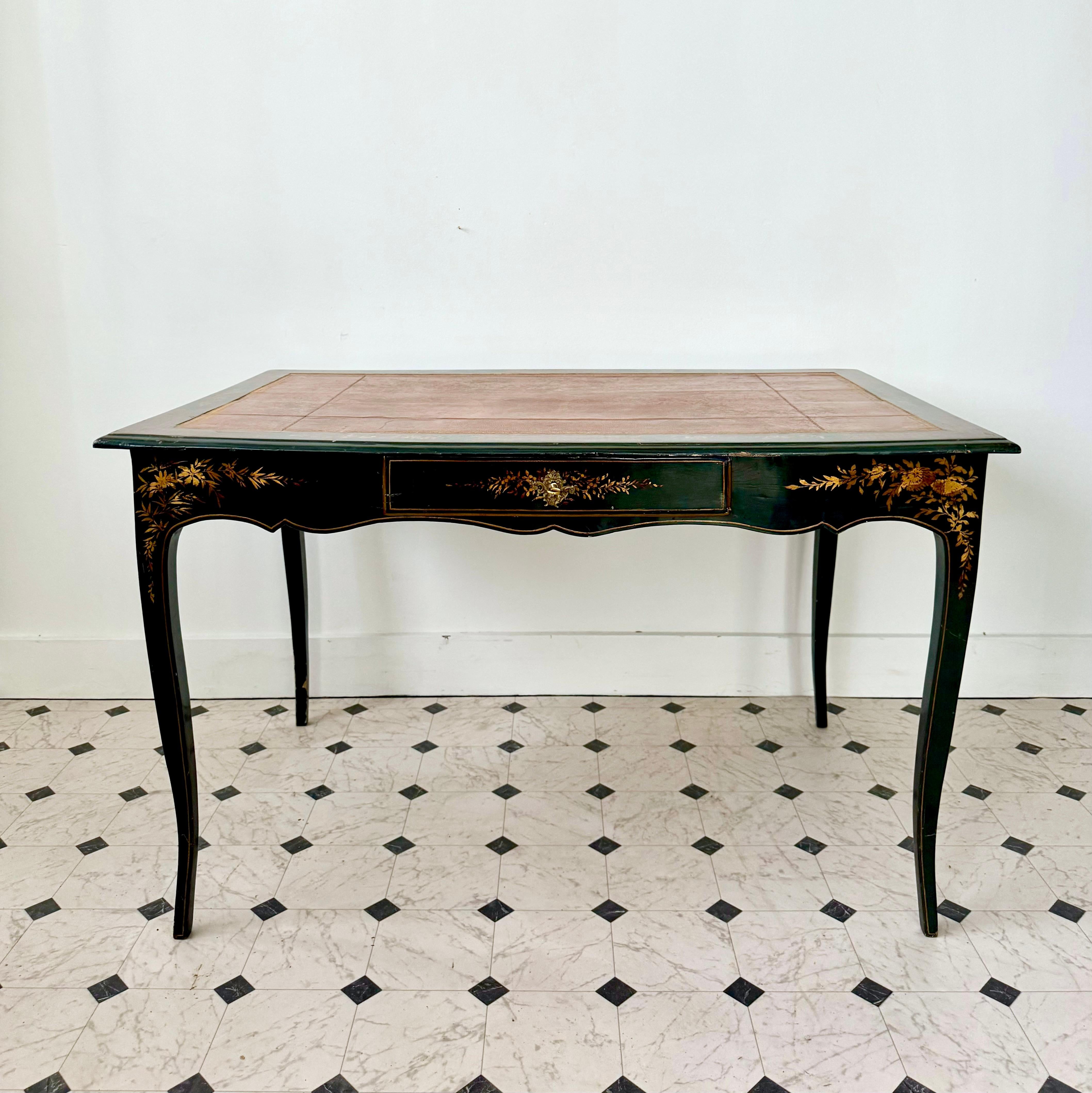 18th century Italian black lacquer desk with the scalloped shape frieze with one bronze fitting drawer.
The rear and sides finished in similar manner without drawer, the top with tooled well patinated leather writing surface - all raised on slender