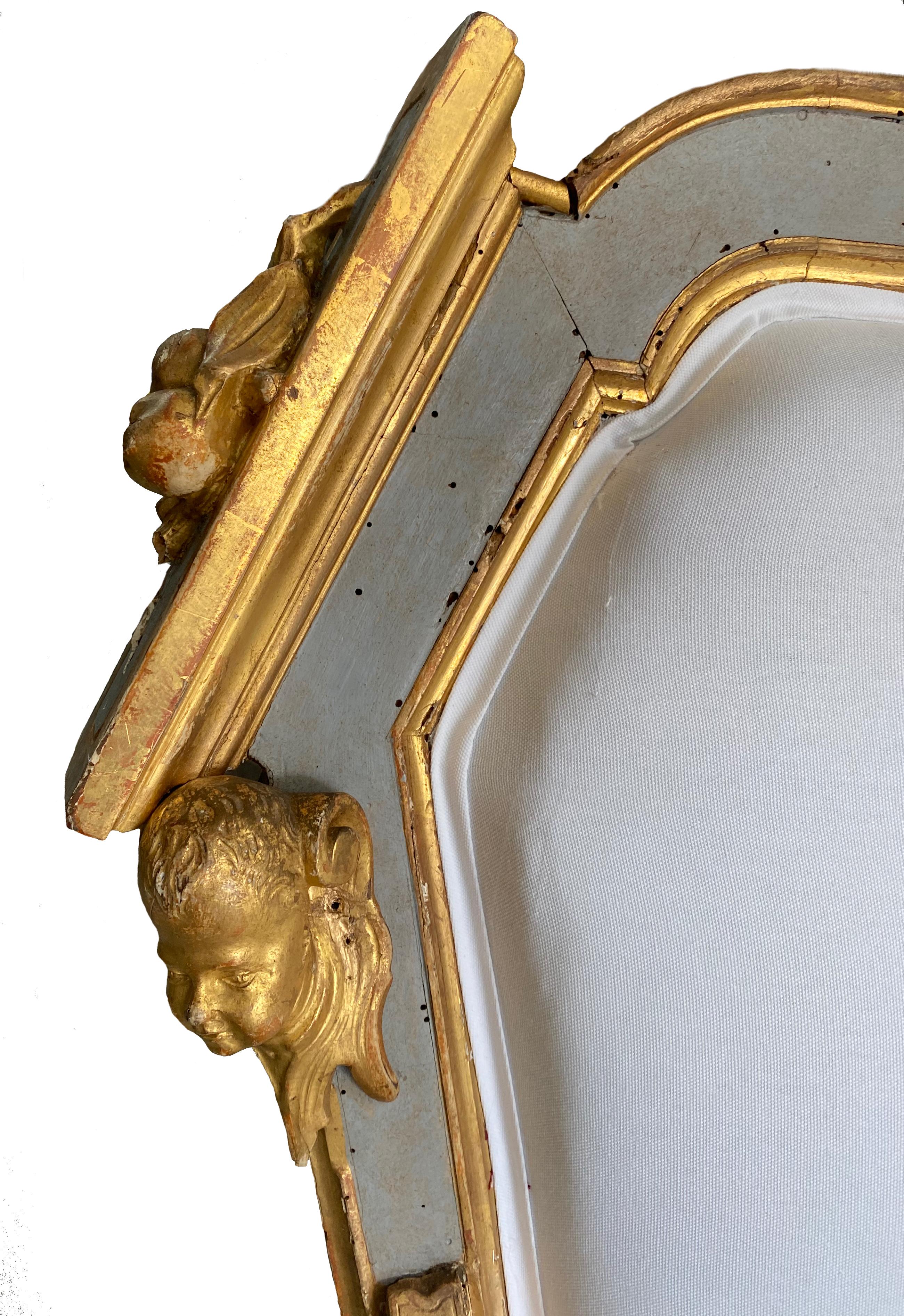 This 18th century settee from Northern Italy will add some major drama to your room. With its ornate details and beautiful blue paint and gilding it is truly one of a kind.