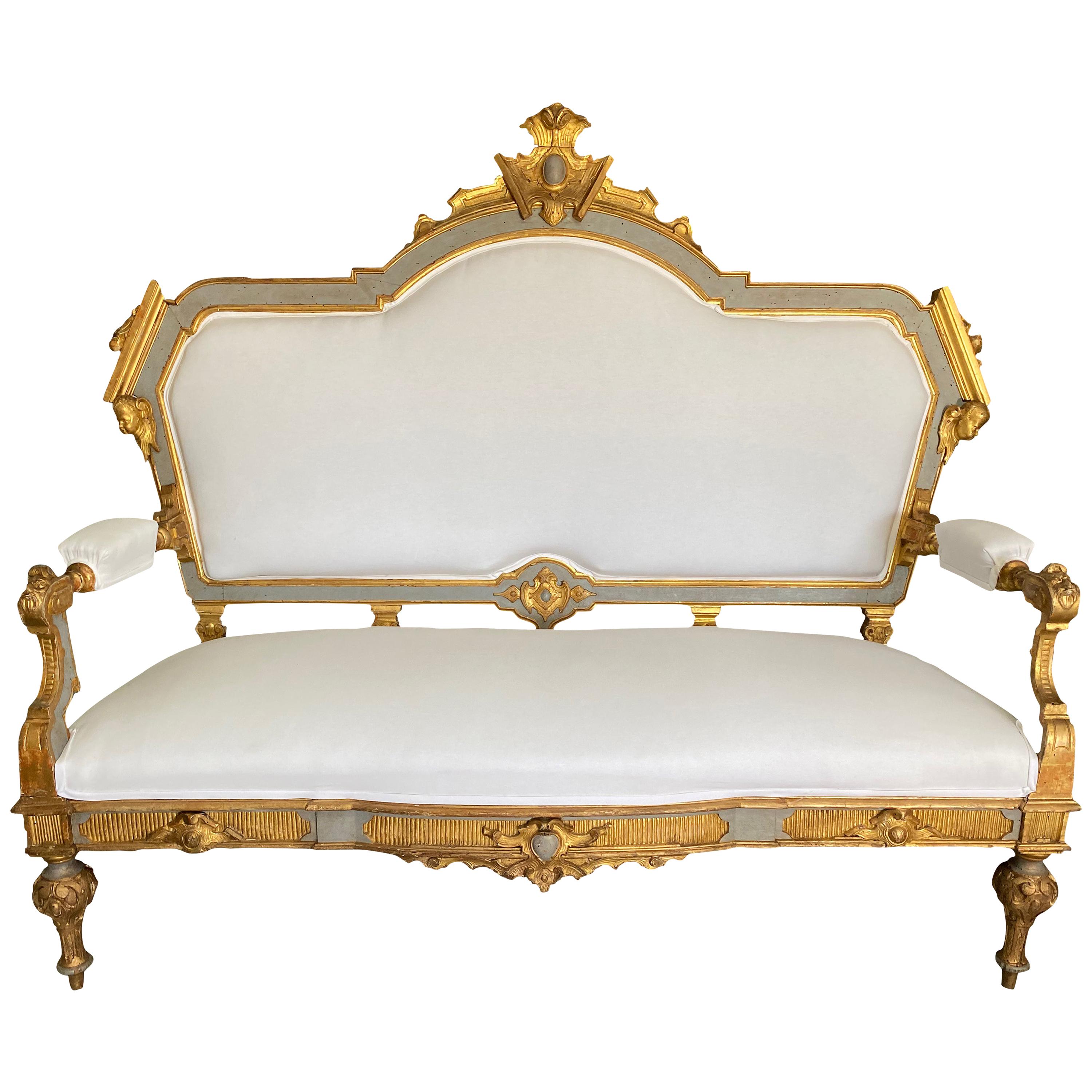 18th Century Italian Blue and Gilt Settee with Putti an Ornate Carved Details