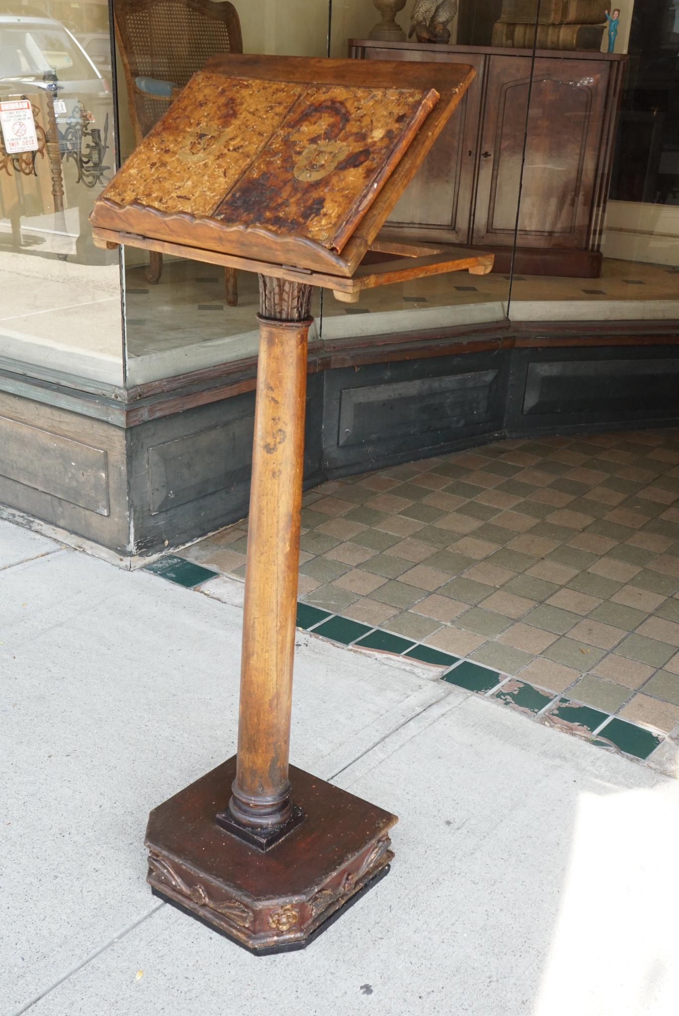 This lovely podium or book stand from Italy was made circa 1760. The actual articulated top is a 19th-century replacement but surely similar to its original top. Made from carved walnut and then painted and stained the stand comes from a Berkshires