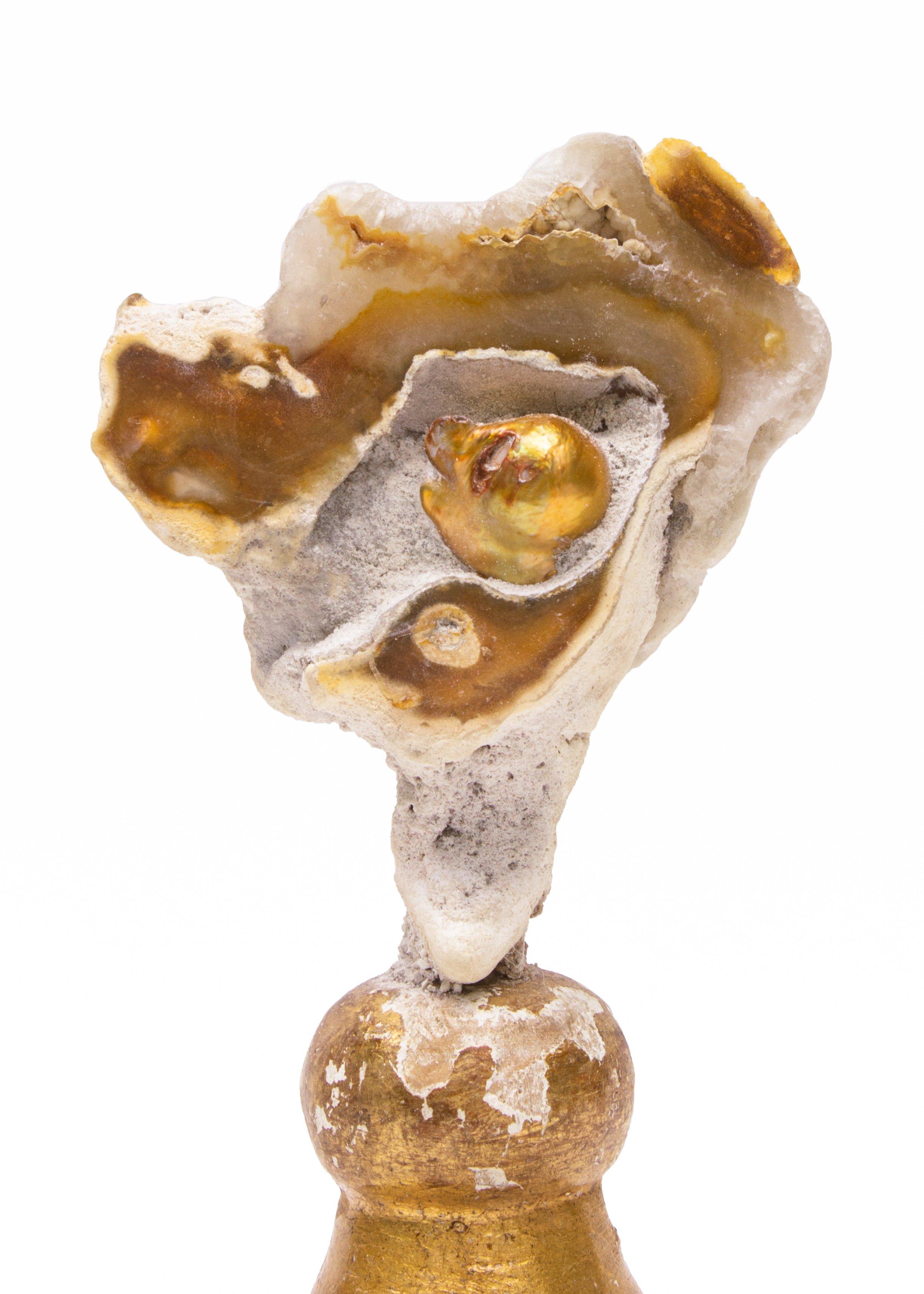 18th century Italian gold leaf candlestick top with polished fossil agate coral and a natural forming baroque pearl. The 18th century fragment comes from Tuscany and has the original candlestick wax drip-tray attached.

Fossil agate coral is also