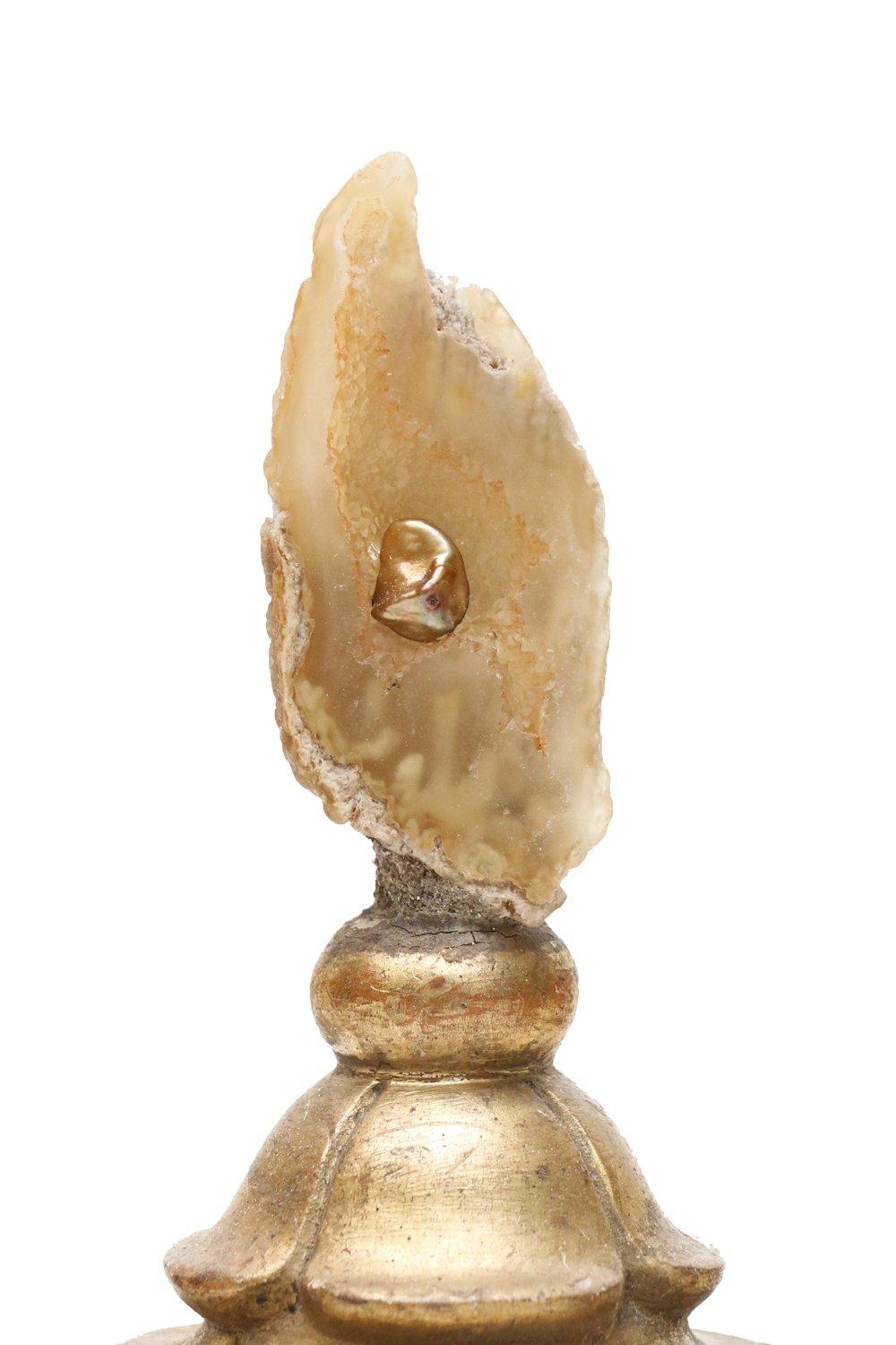 18th century Italian candlestick top with polished fossil agate coral with a natural forming Baroque pearl.

The 18th century candlestick top originally came from a candlestick from a church in Tuscany.
Agate coral is Florida's state stone and is