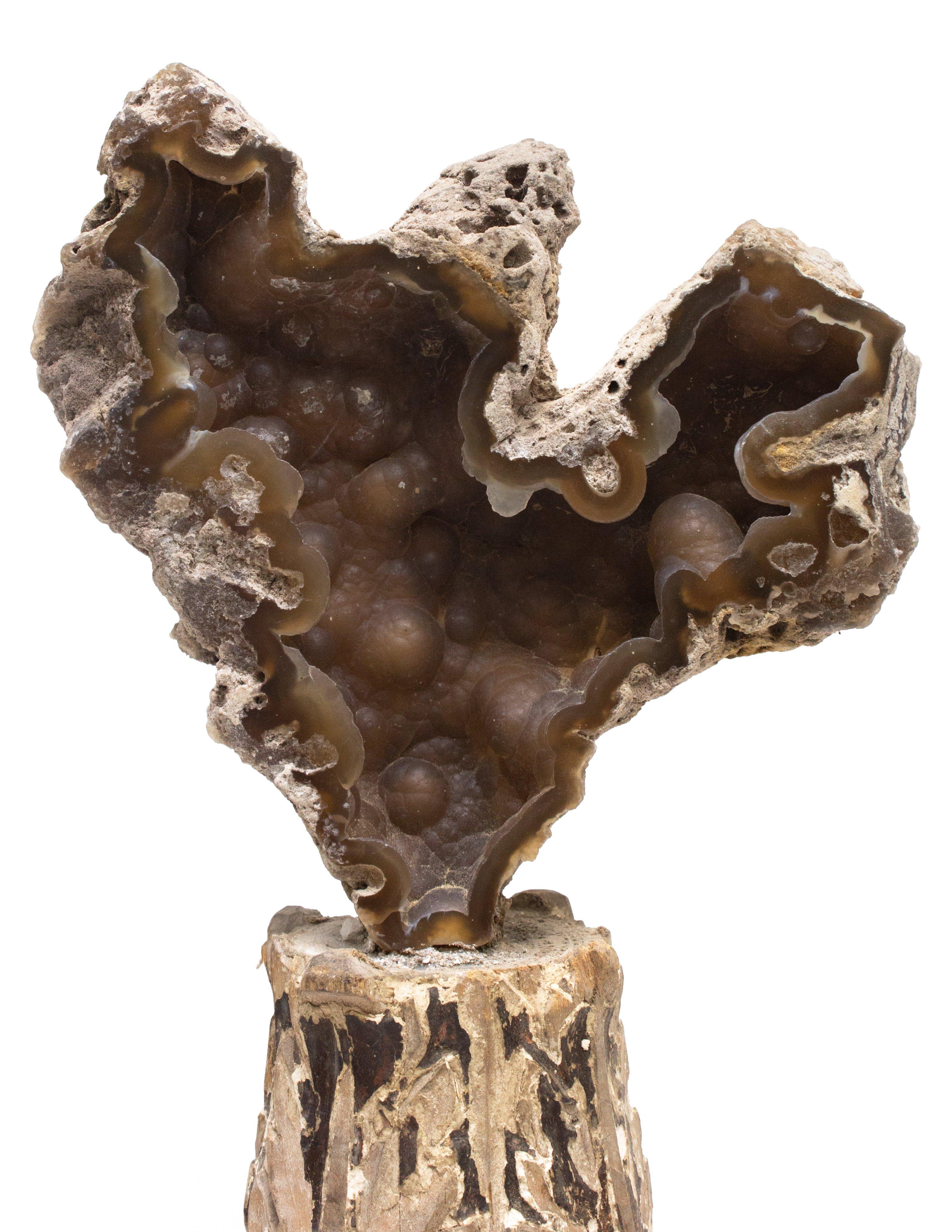 18th century Italian candlestick decorated with fossil agate coral on an agate base. The hand carved 18th century Italian candlestick originally comes from a church in Florence. This particular fragment candlestick was also one found and saved in