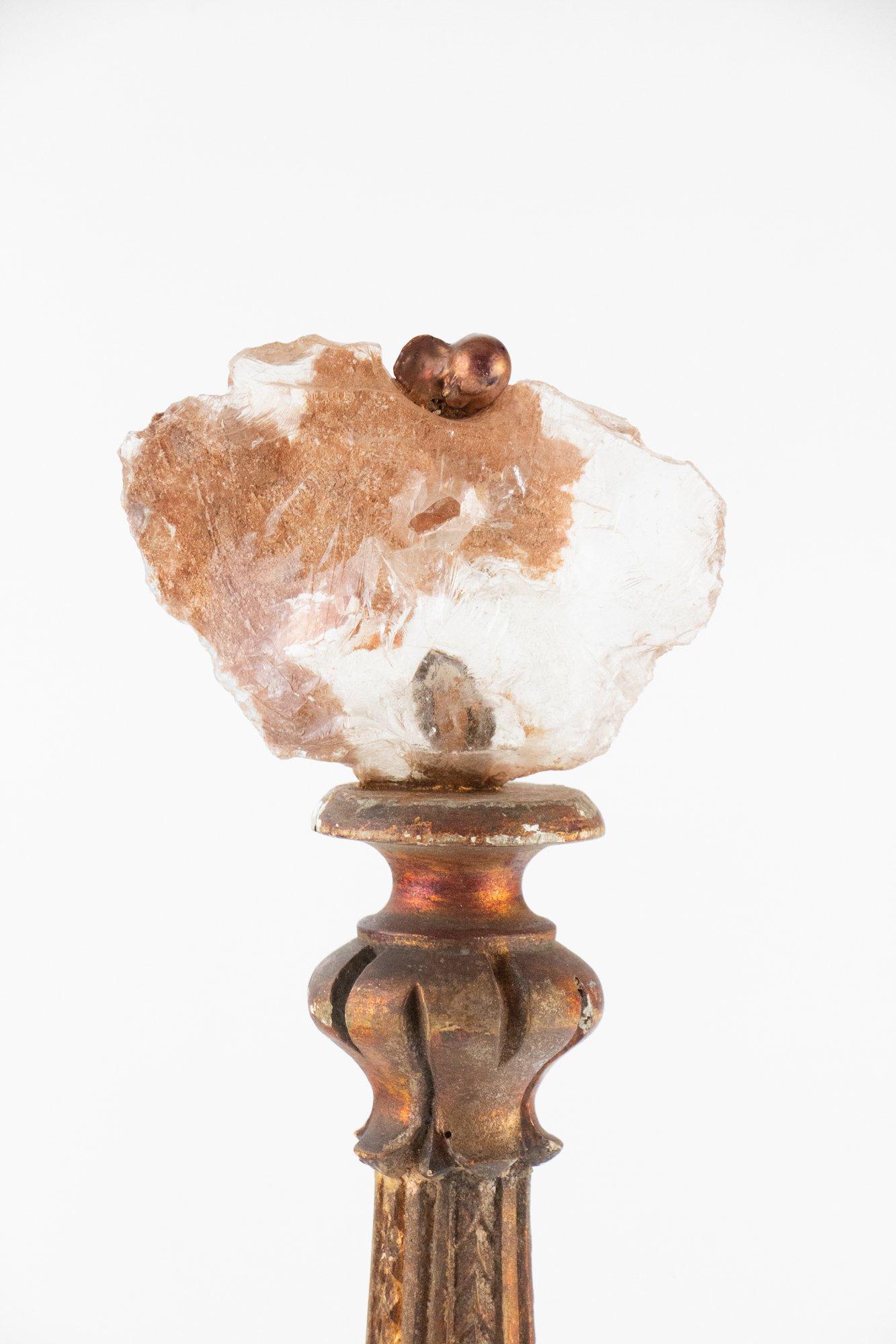 18th century Italian candlestick decorated with free-forming glass and baroque pearls on an Italian glass bobeche base.

The 18th century candlestick is from Tuscany. It is hand carved and hand painted with brownish-red metallic paint. It is