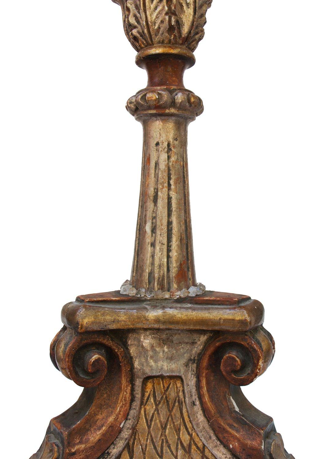 18th century Italian candlestick decorated with a smokey quartz crystal polished oblique point with coordinating smokey quartz crystals surrounding the point. The candlestick originally came from a church in the southern region of Tuscany. It has