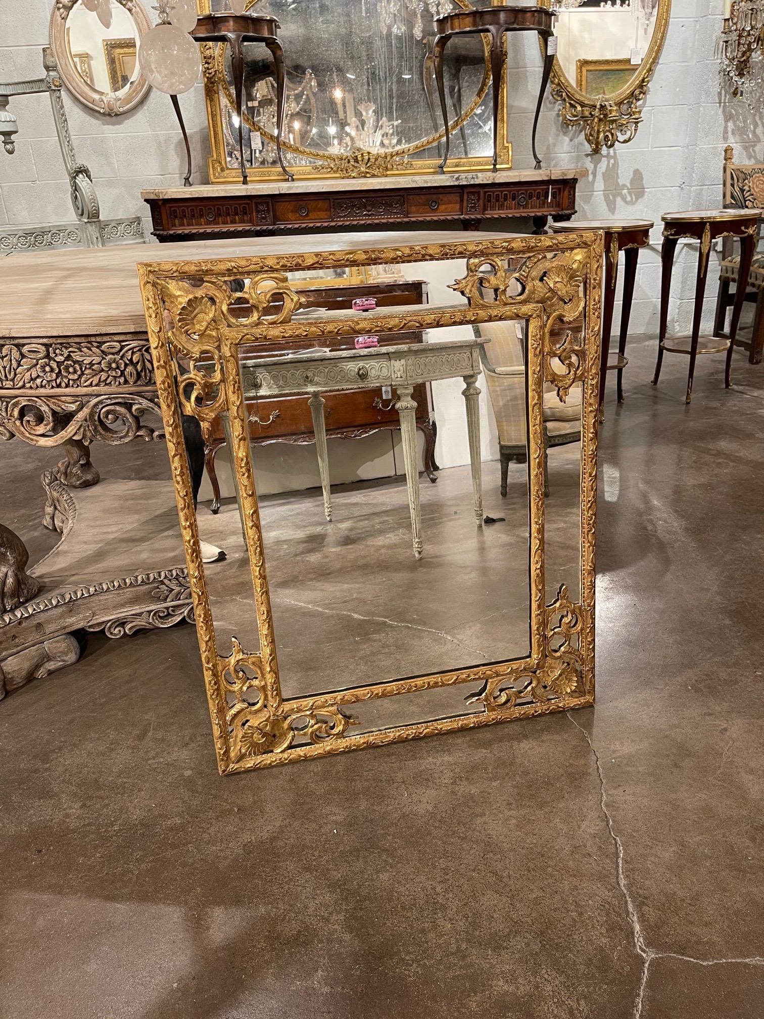 Beautiful 18th century Italian carved and giltwood mirror. Very fine intricate carvings on this piece. Would work well in a variety of settings.