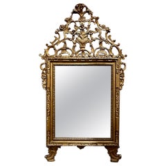 Specchio italiano del XVIII secolo intagliato e in legno dorato