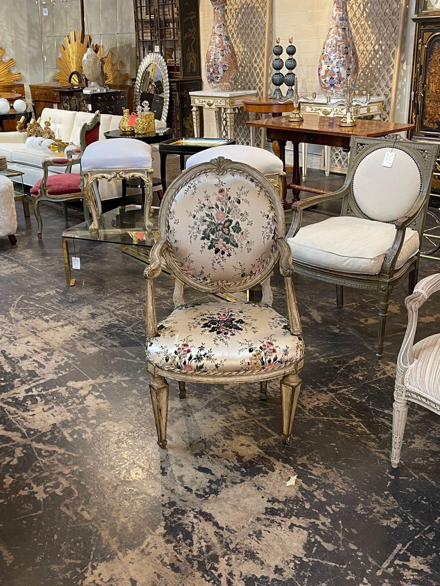 Very nice decorative 18th century Italian carved and painted armchair upholstered in a lovely floral fabric. A beautiful accent piece with really nice carvings and patina! Gorgeous!