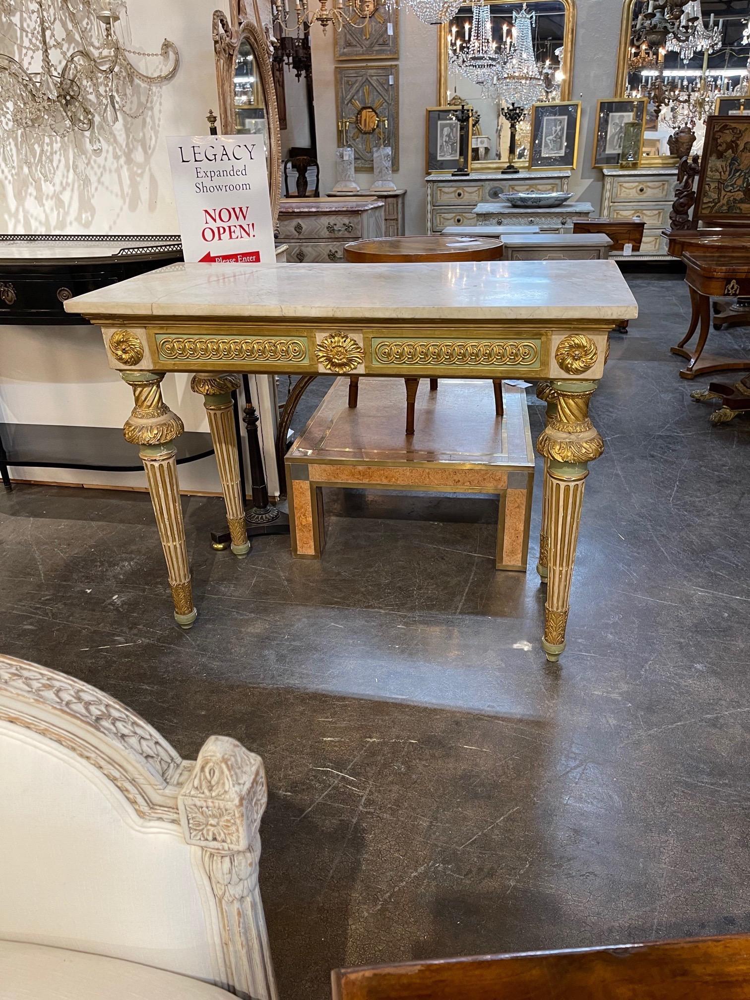 Fabulous 18th century Italian carved and parcel gilt console from Sicily. Very Fine intricate carvings on this piece along with a beautiful marble top. Creates a very upscale look. Exquisite!