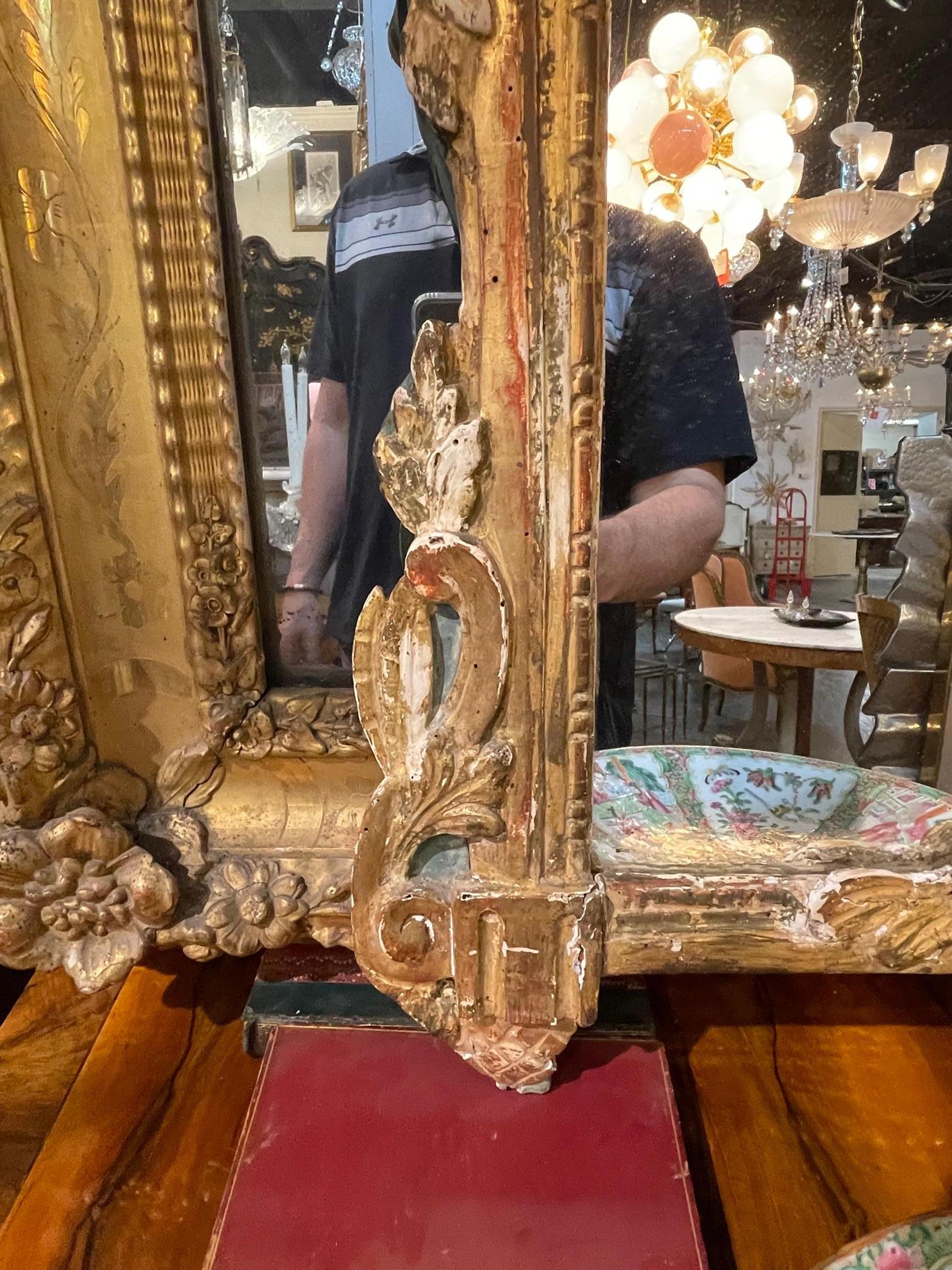 Giltwood 18th Century Italian Carved and Parcel Gilt Mirror For Sale