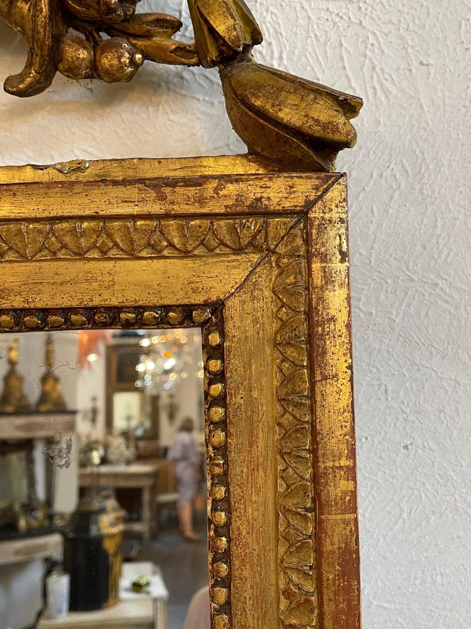 Giltwood 18th Century Italian Carved and Parcel Gilt Neoclassical Mirror
