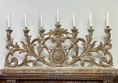 Bougeoir italien en bois sculpté et doré à l'argent du XVIIIe siècle