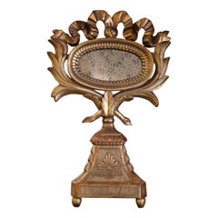Specchio reliquiario in legno dorato intagliato del XVIII secolo con vetro al mercurio