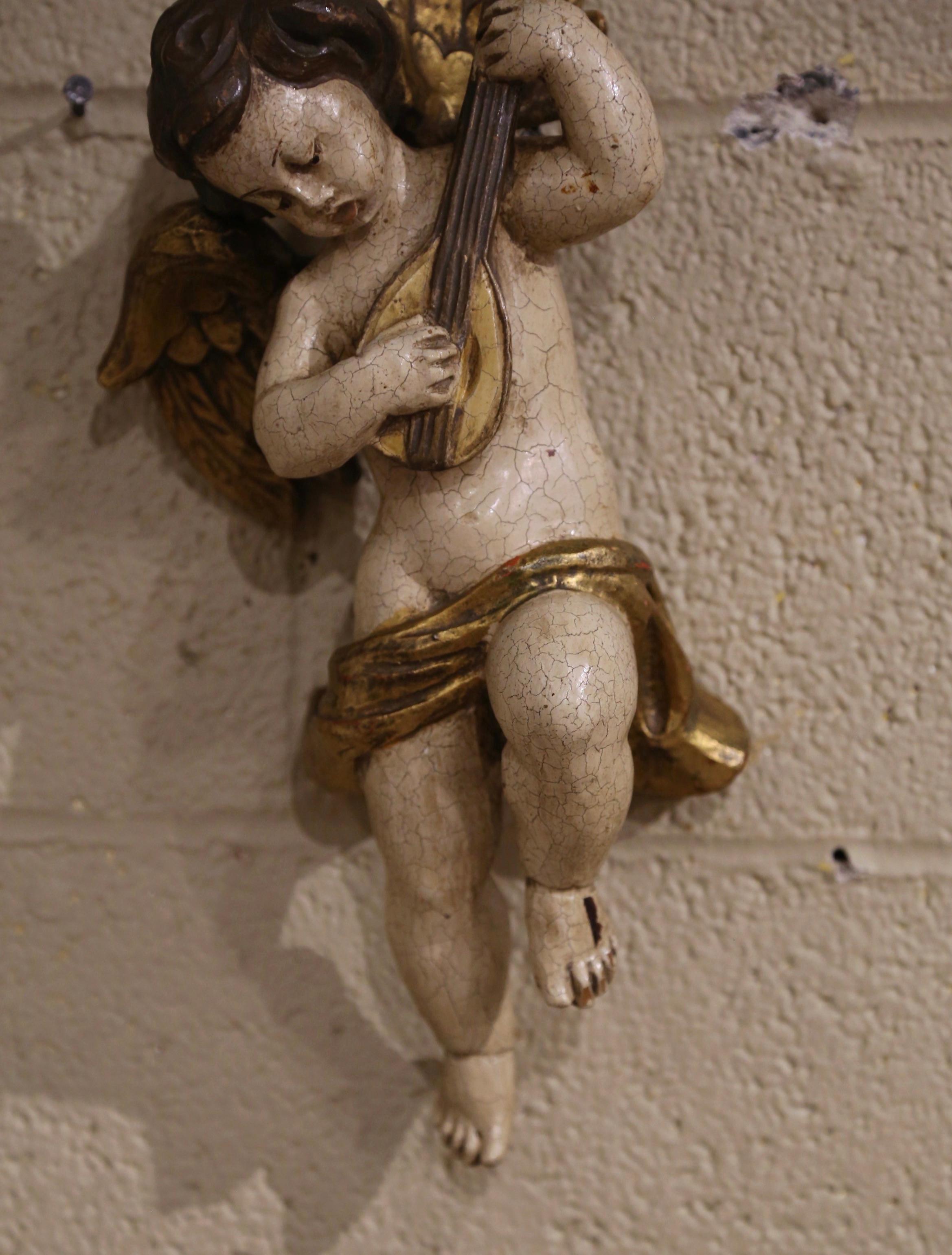 Hand-Carved 18th Century Italian Carved Giltwood and Polychrome Musician Cherub Sculpture For Sale