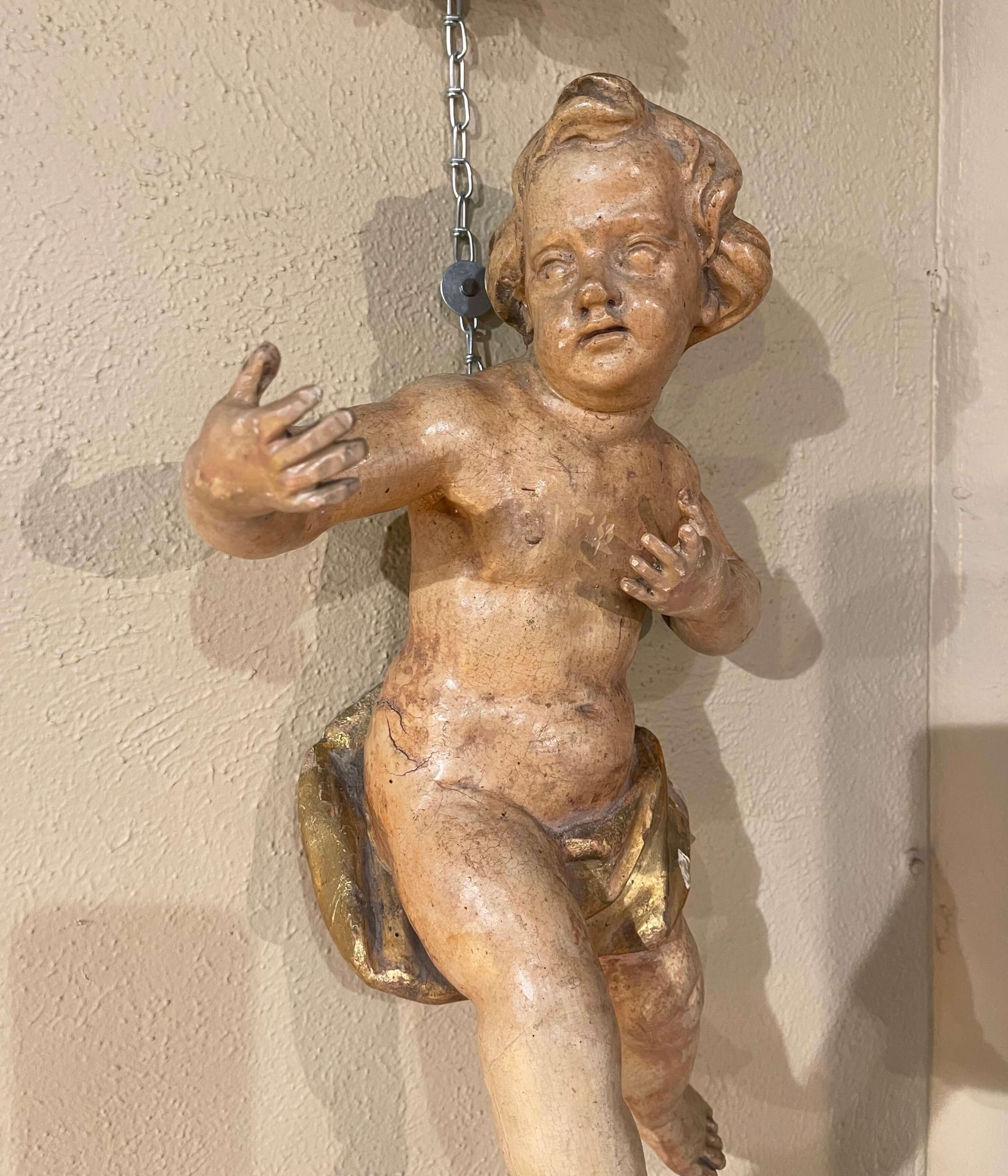 Hand-Carved 18th Century Italian Carved Giltwood Polychrome Cherub Sculpture For Sale