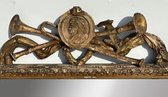 18th Century Italian Carved Mirror with Portrait Cartouche