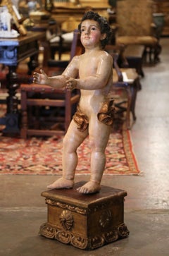 18th Century Italian Carved Polychrome Life Size Putti on Stand with Glass Eyes