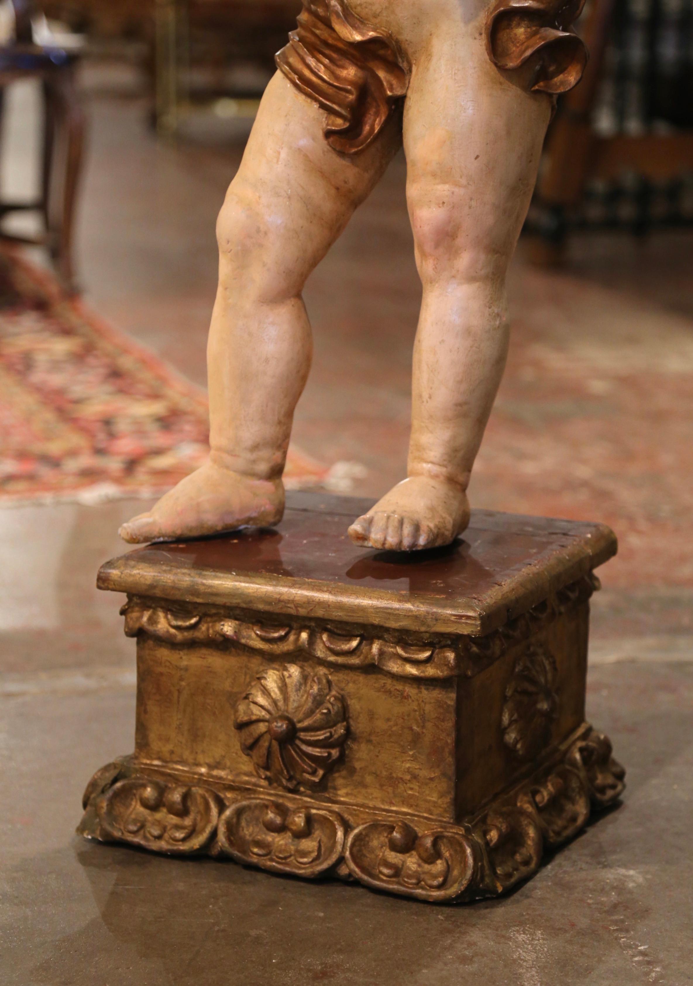 Polychromed 18th Century Italian Carved Polychrome Life Size Putti on Stand with Glass Eyes For Sale