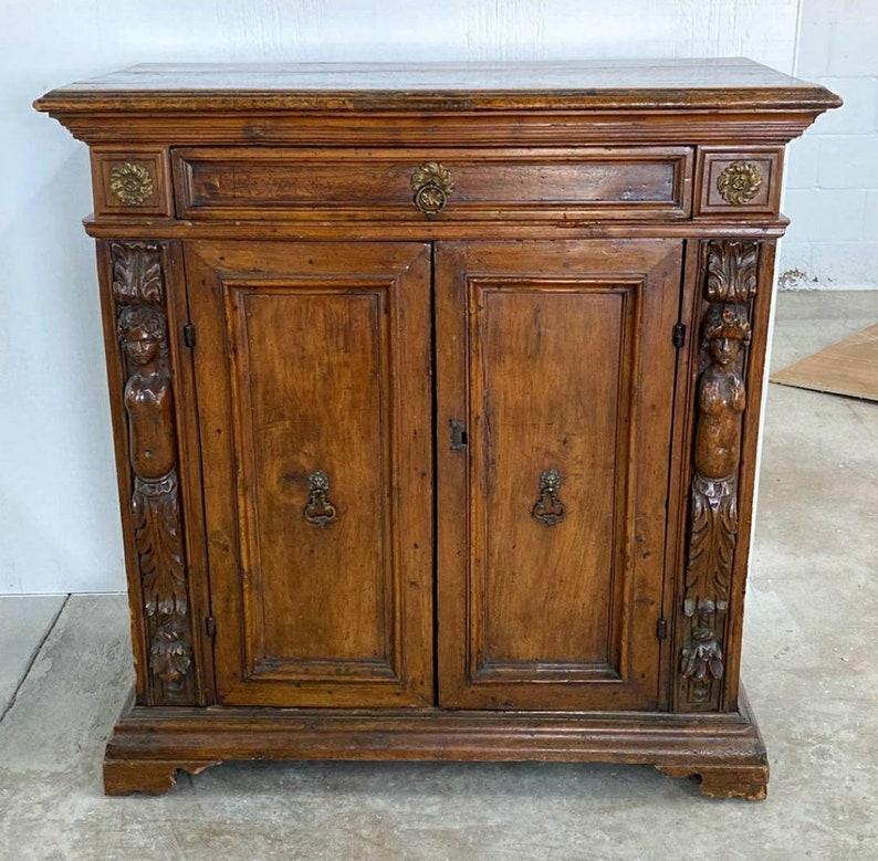 Renaissance 18th Century Italian Carved Walnut Cabinet For Sale