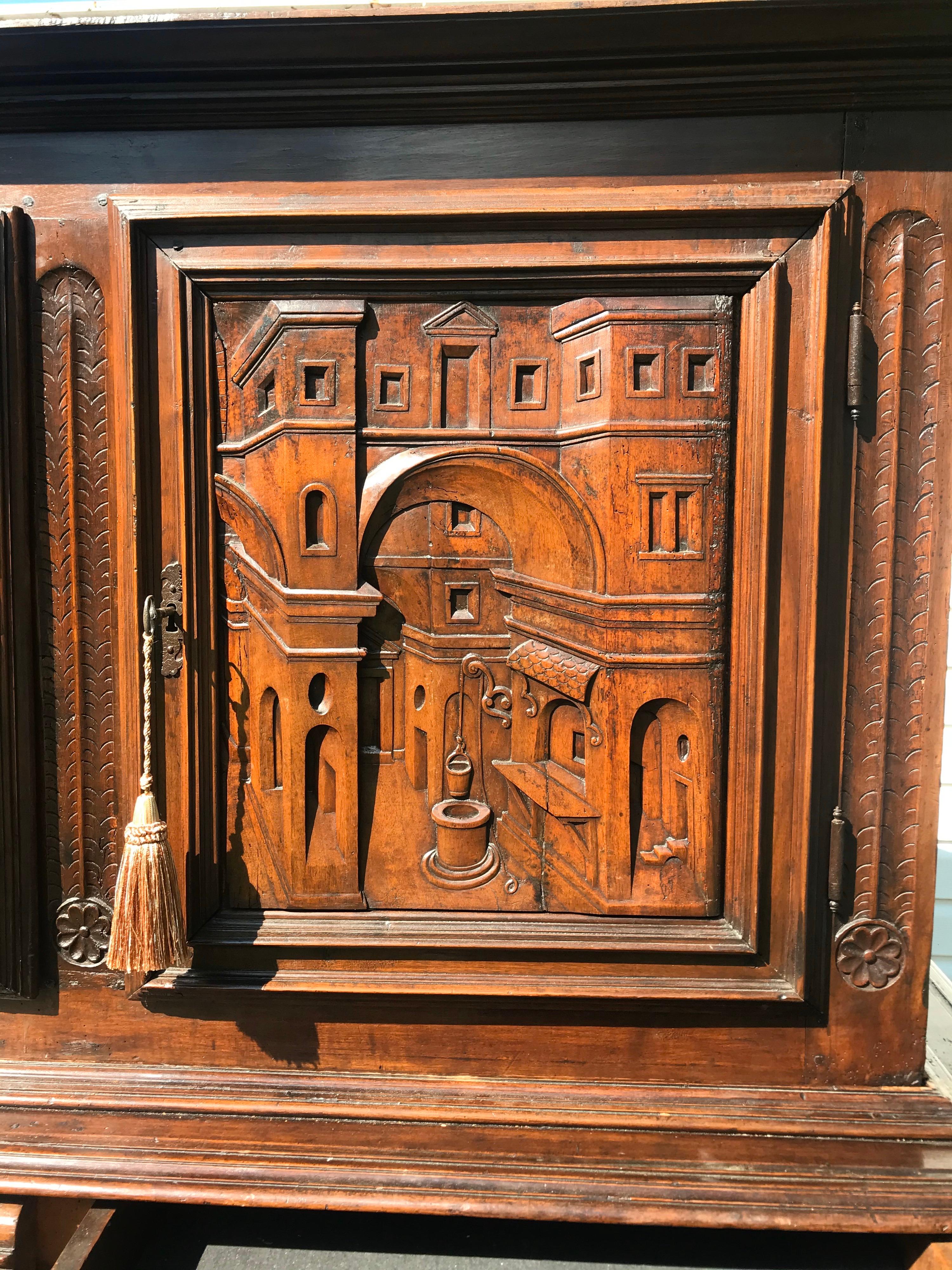 18th Century Italian Carved Walnut Cupboard with Italian Scenes Carved in Doors 4