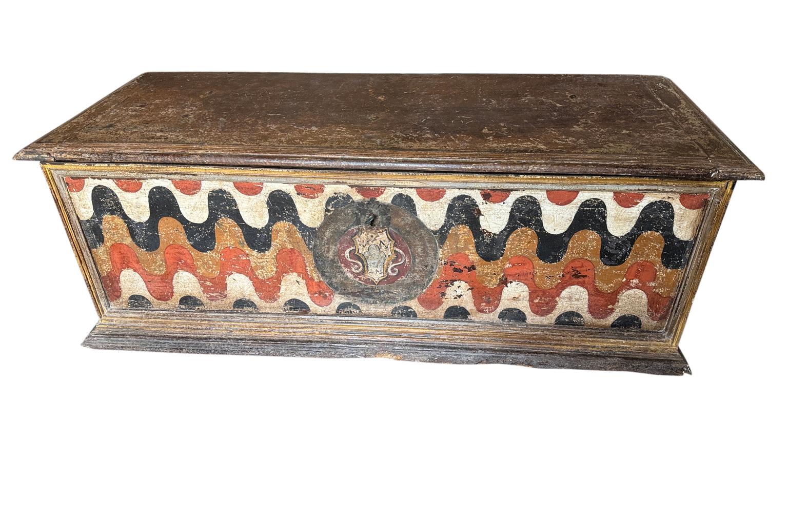 A stunning mid-18th century Cassapanca from the Siena region of Italy. Wonderfully constructed from polychromed wood with gorgeous painting detail and color. Fabulous patina. 